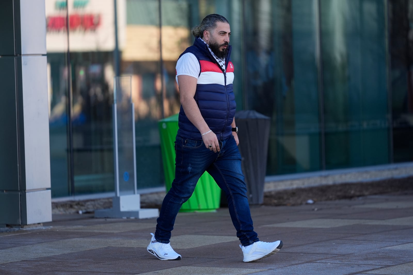 Odai Alfayoumi, father of six-year-old Palestinian boy Wadee Alfayoumi, leaves the Will County Courthouse where Joseph Czuba, 73, is charged with and on trial in the fatal stabbing of the boy and the wounding of his mother Hanan Shaheen, Tuesday, Feb. 25, 2025, in Joliet, Ill. (AP Photo/Erin Hooley)