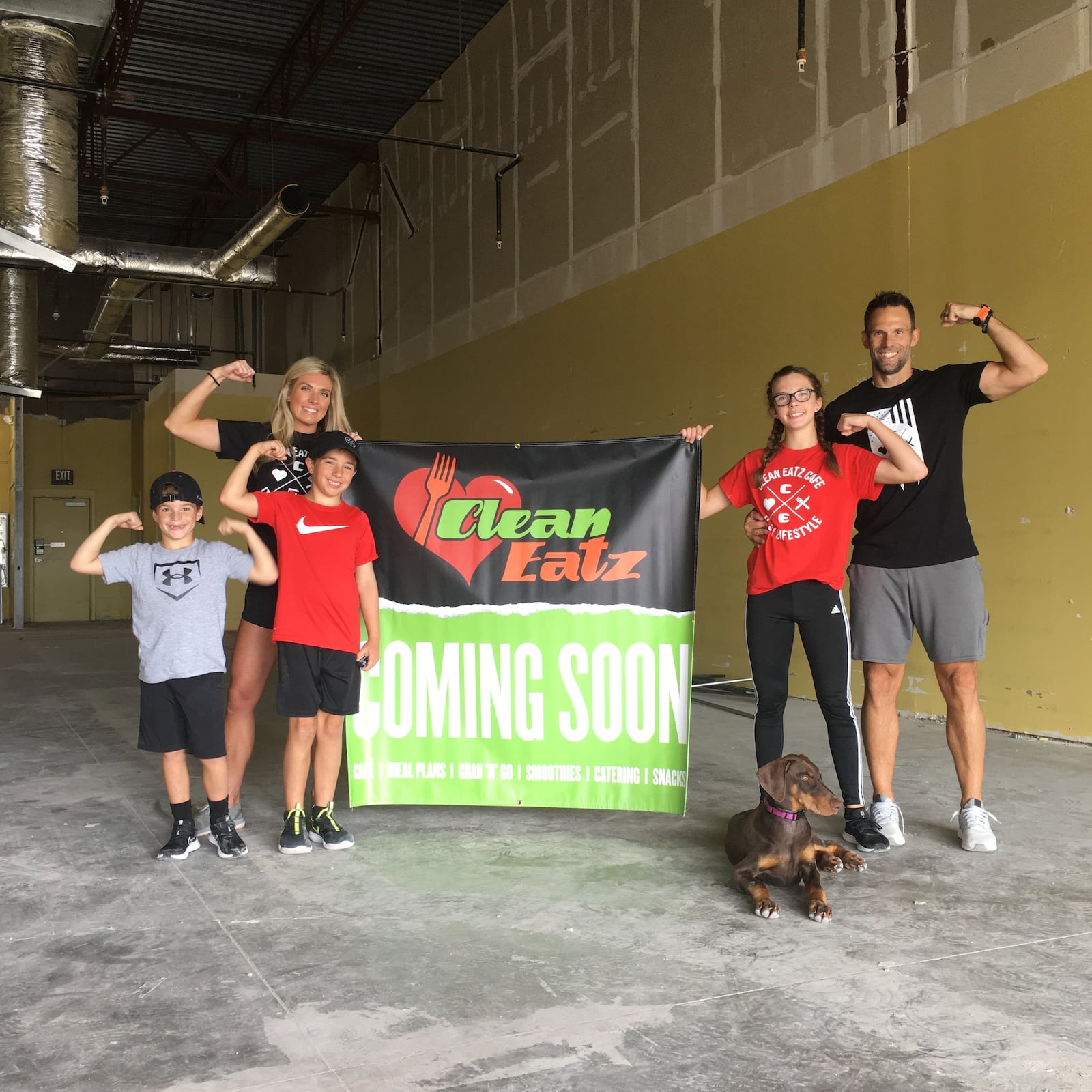 The Dobrozsi family, from left Austin, Andrea, Avin, Ailee and Adam, is excited about opening the first Eatz Cafe in Butler County later this month. They are joined by their dog, Lady Red. SUBMITTED PHOTO
