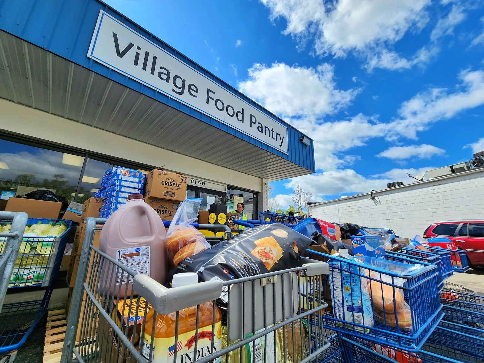 Items ready to be handed out at New Miami's Village Food Pantry on Wednesday, May 3. A pantry official estimated nearly 325 families were served.