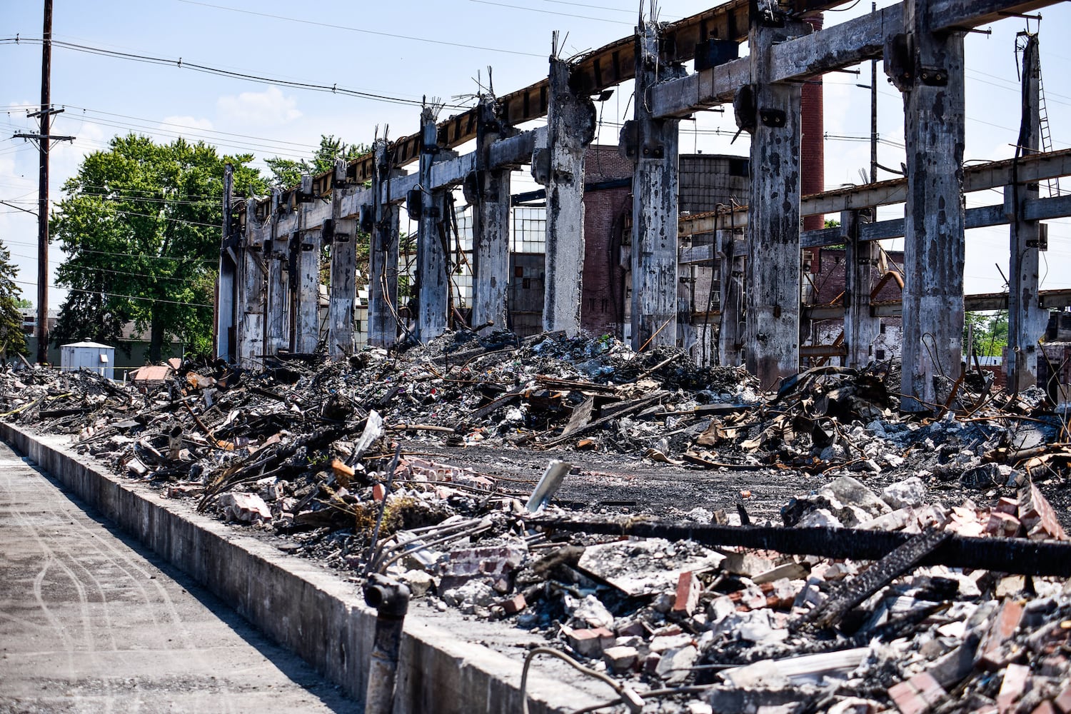 Crews demolish warehouse after massive fire in Hamilton