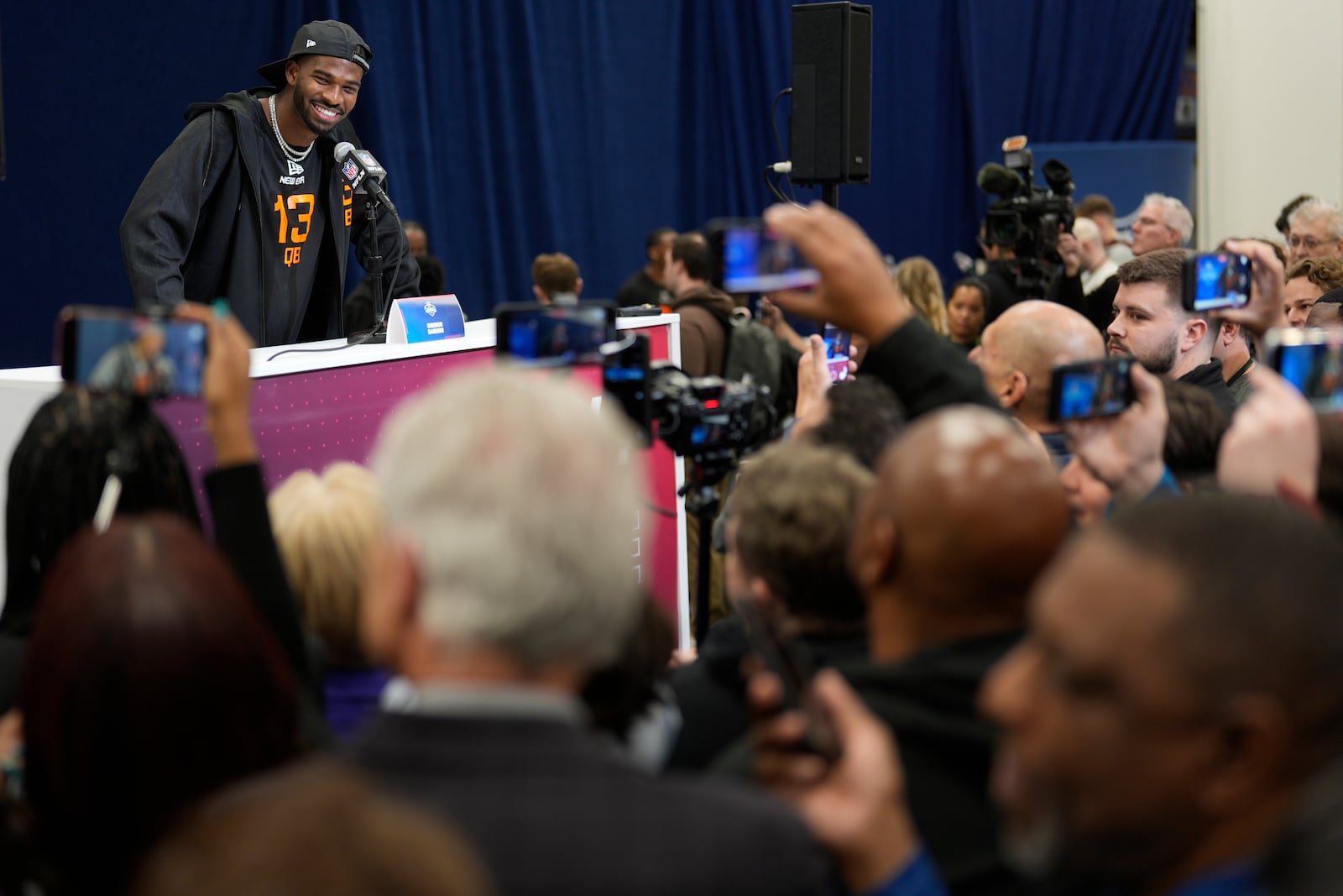 Colorado quarterback Shedeur Sanders speaks during a press conference at the NFL football scouting combine Friday, Feb. 28, 2025, in Indianapolis. (AP Photo/George Walker IV)