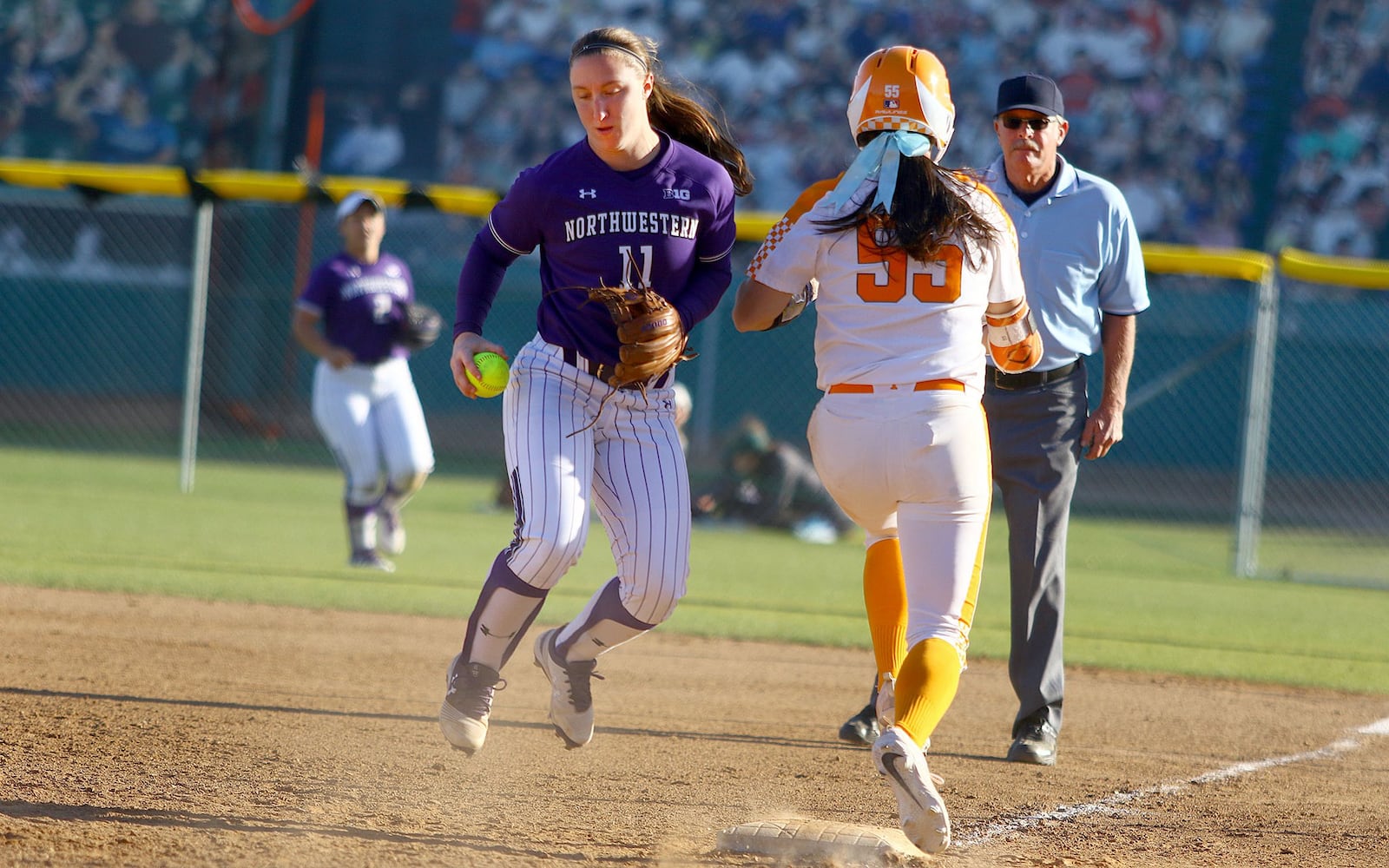 Northwestern University second baseman Rachel Lewis makes a play at first during a game against Tennessee on Feb. 24 in Cathedral City, Calif. PHOTO COURTESY OF NORTHWESTERN ATHLETICS