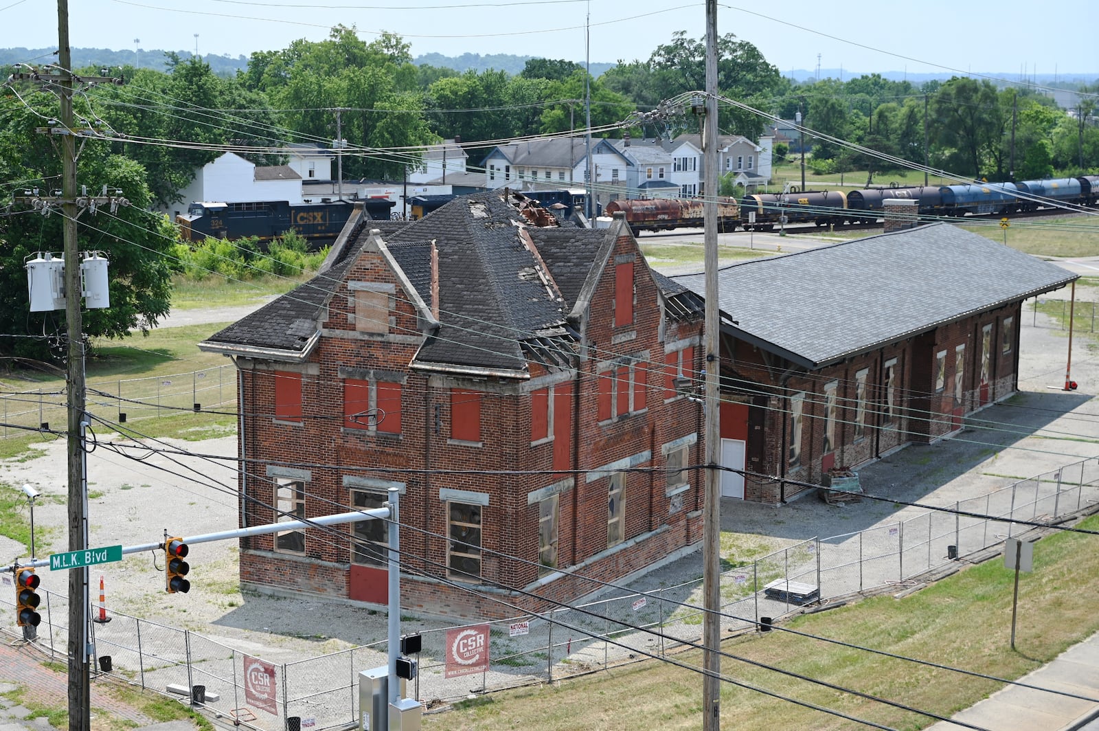 The CSX Train Depot, which was relocated north by 1,000-plus feet in December 2022 and January 2023 to the corner of Maple Avenue and Martin Luther King Jr. Boulevard. Historic Hamilton donated $10,000 through the Hamilton Community Foundation to the continued preservation historic depot. Pictured is the depot on June 17, 2024, from the top floor of the parking garage at the corner of Maple Avenue and MLK Boulevard. MICHAEL D. PITMAN/STAFF