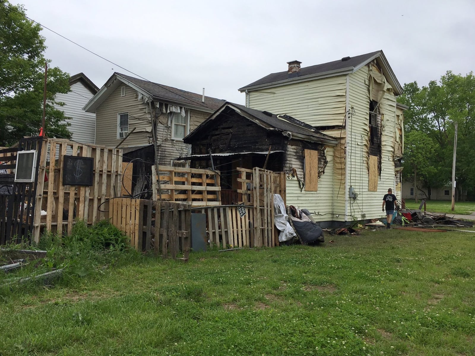 One Hamilton firefighter was injured after a fire Wednesday night, May 10, at this home on Ludlow Street. 