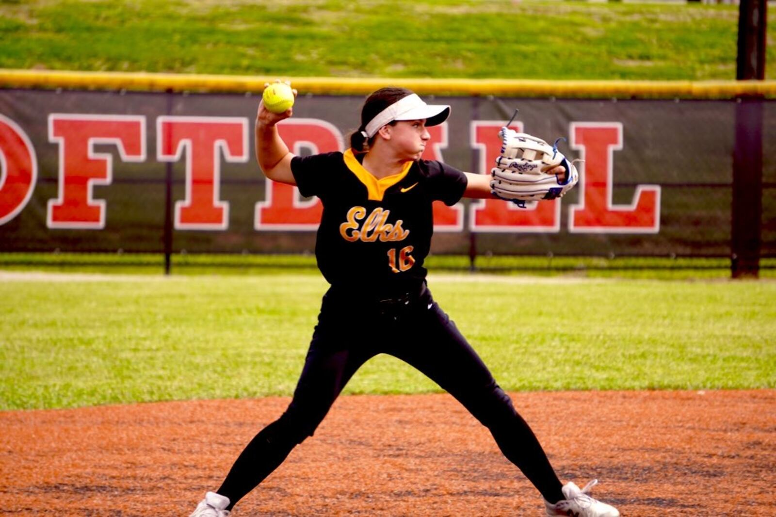 Centerville's Natalie Carr looks to make a throw to first base against Fairfield on Friday night at Indian Hill. Chris Vogt/CONTRIBUTED