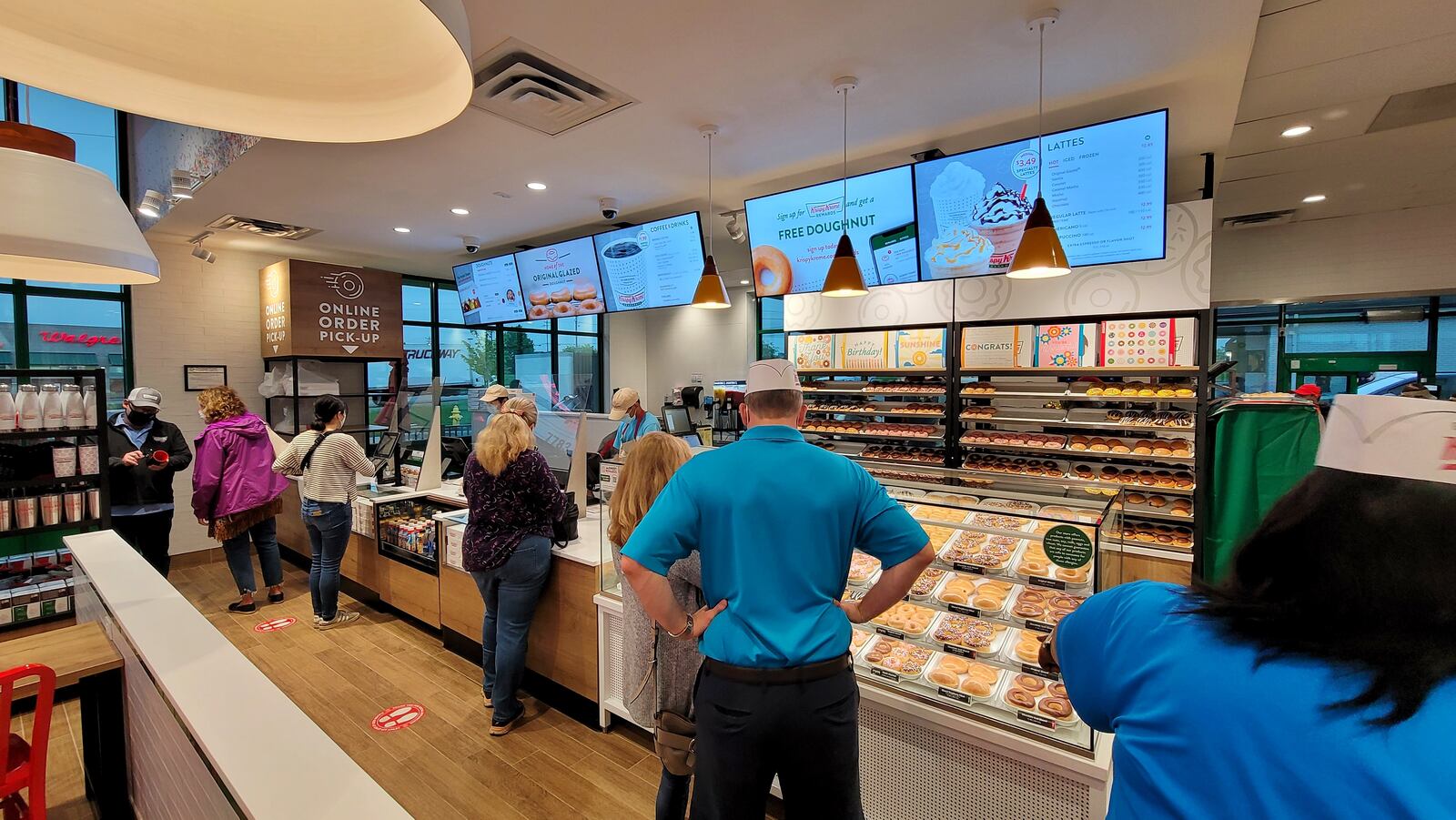 Sales at Krispy Kreme in West Chester, the first Butler County location, were brisk this morning on the first day the restaurant was open. NICK GRAHAM/STAFF