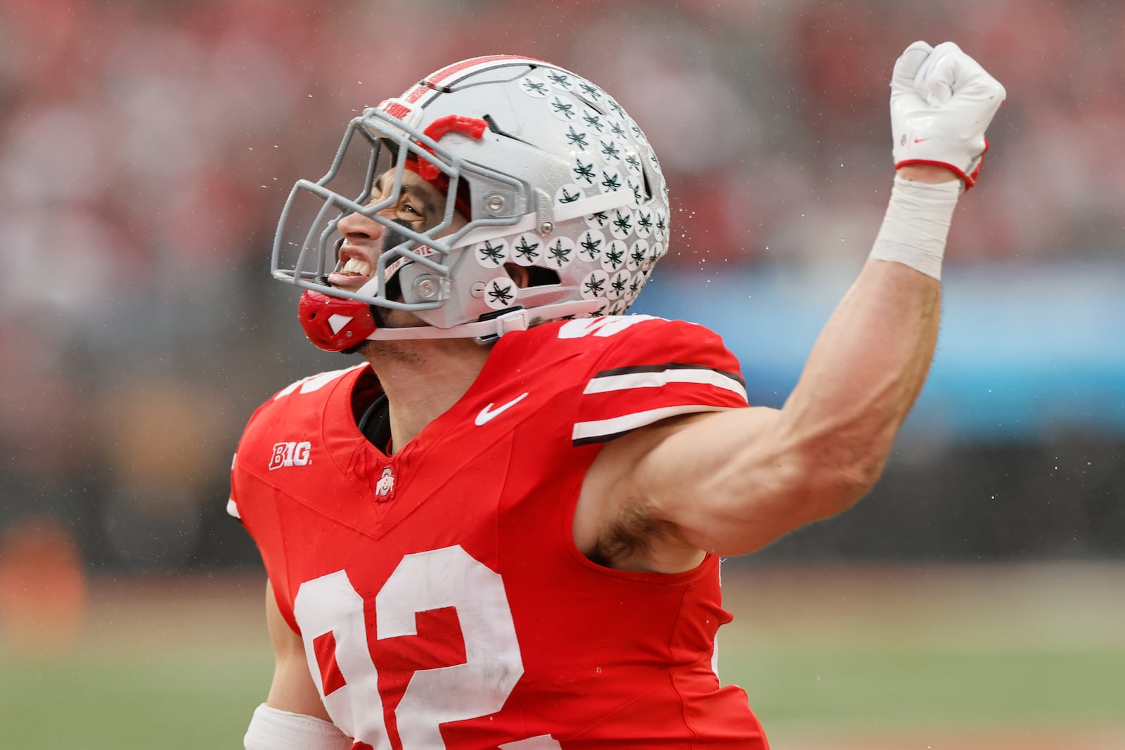 Ohio State defensive lineman Caden Curry, right, celebrates after tackling ther Indiana punter on a mishandled snap during the first half of an NCAA college football game Saturday, Nov. 23, 2024, in Columbus, Ohio. (AP Photo/Jay LaPrete)