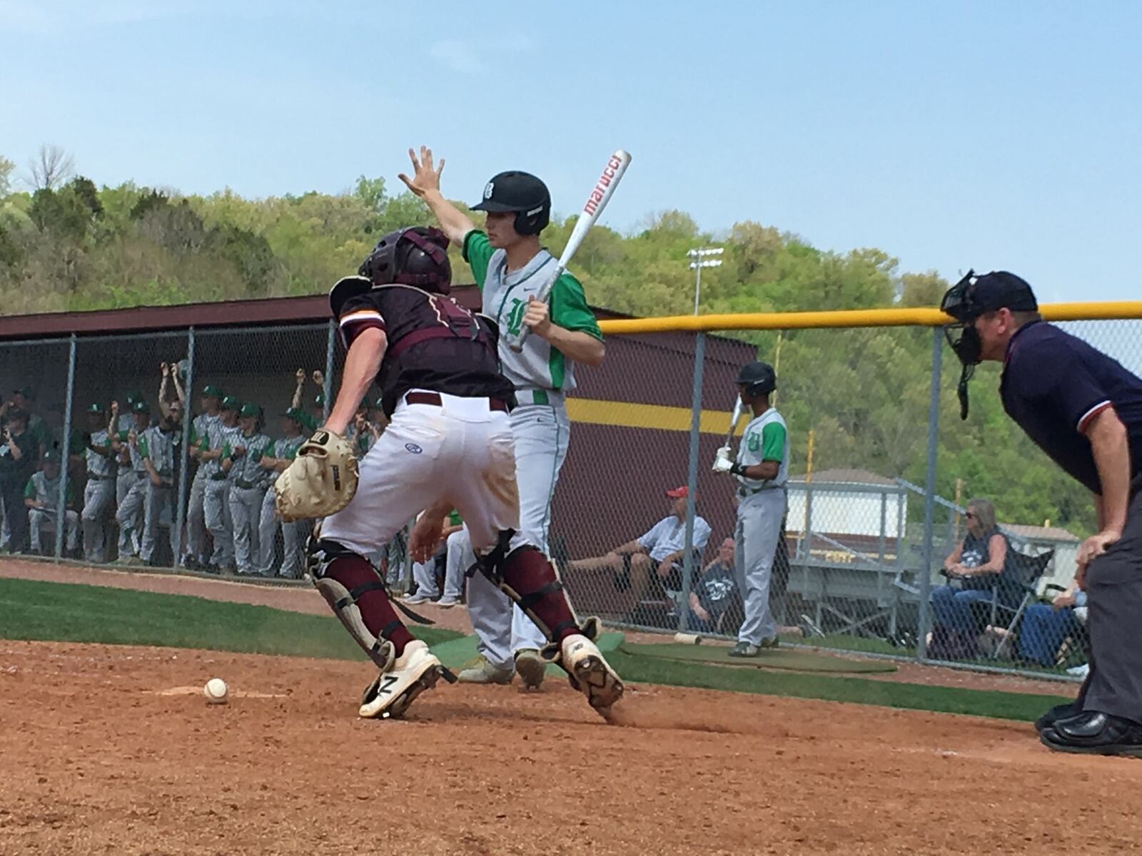 Badin High School’s Mitchell Ahr motions for a teammate to hold up on an errant pitch to Ross catcher Andrew Beebe during Sunday afternoon’s 5-4 win by host RHS. RICK CASSANO/STAFF