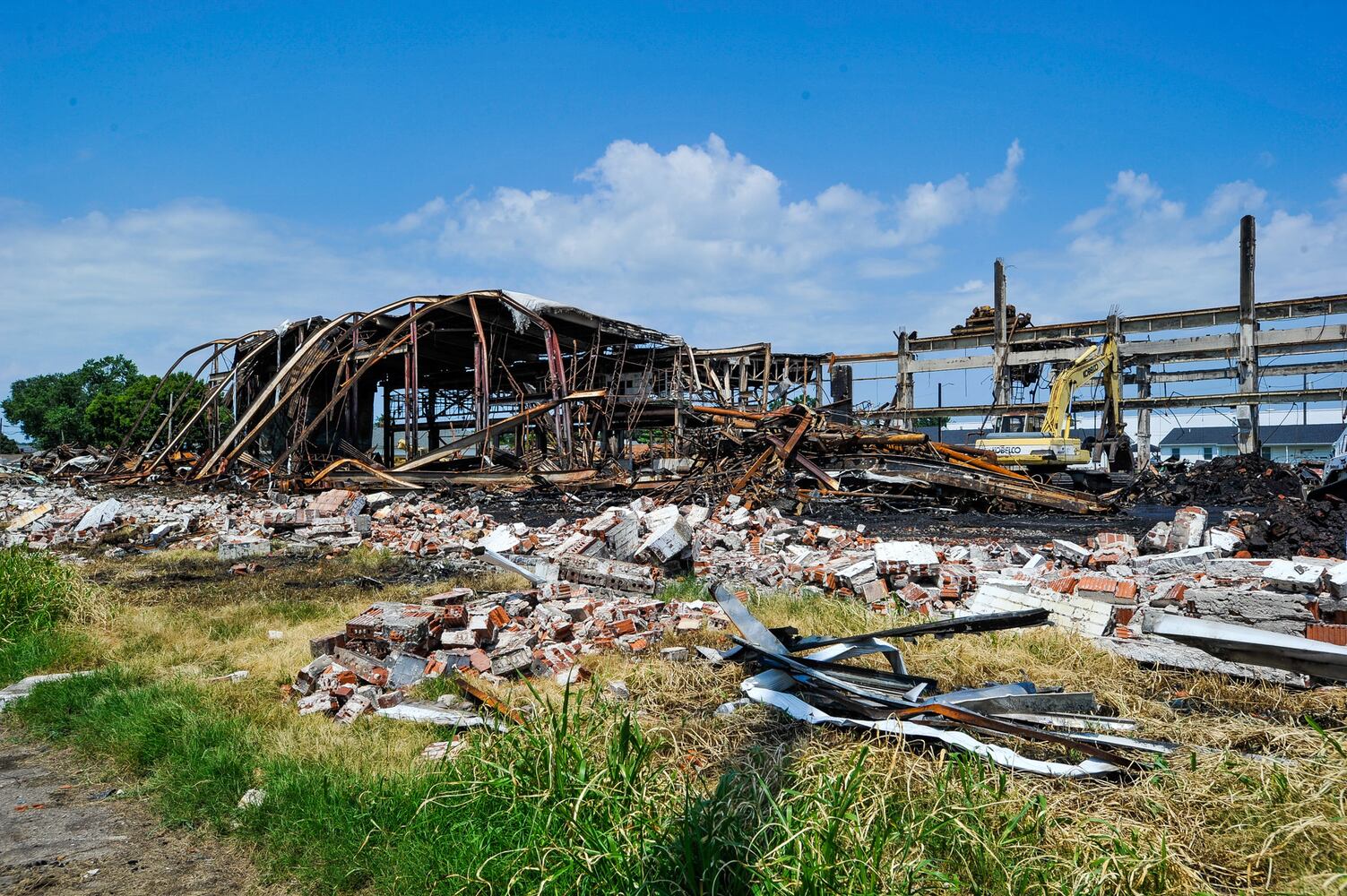 Crews demolish warehouse after massive fire in Hamilton