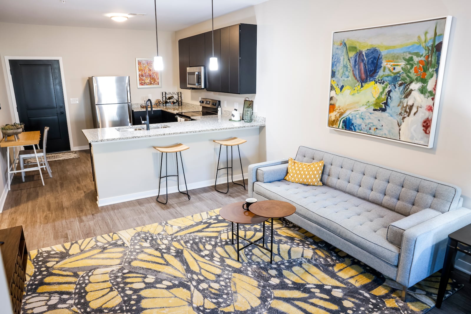 Apartments at Rossville Flats on Main Street in Hamilton are nearing completion with possible move-in starting in the end of October. This is a one bedroom design that has been staged with furniture. NICK GRAHAM/STAFF