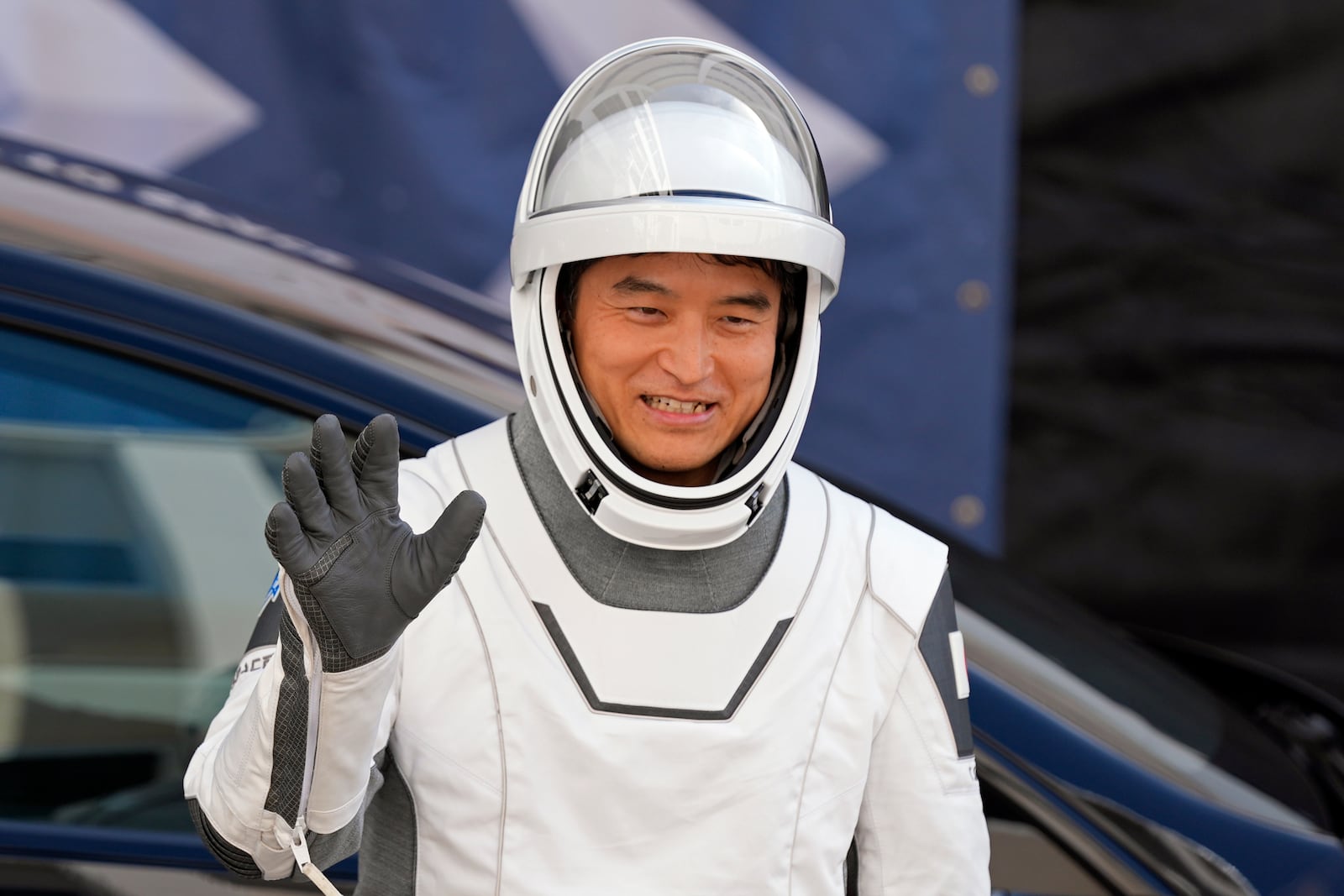 JAXA astronaut Takuya Onishi leaves the Operations and Checkout building before heading to Launch Pad 39-A at the Kennedy Space Center in Cape Canaveral, Fla., for a mission to the International Space Station in Cape Canaveral, Fla., Friday, March 14, 2025. (AP Photo/John Raoux)