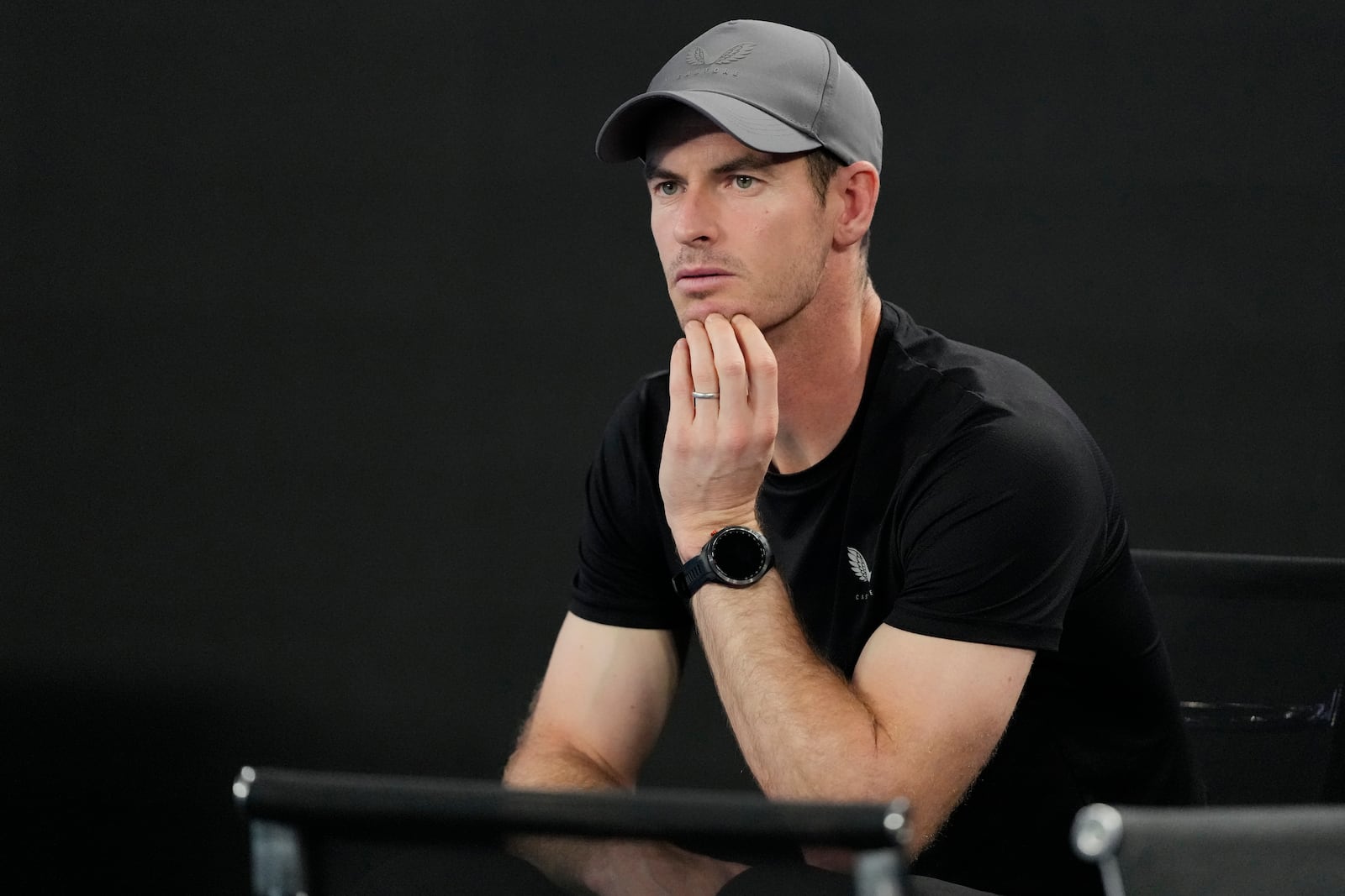 Andy Murray, coach of Novak Djokovic of Serbia, watches his second round game against Jaime Faria of Portugal at the Australian Open tennis championship in Melbourne, Australia, Wednesday, Jan. 15, 2025. (AP Photo/Vincent Thian)