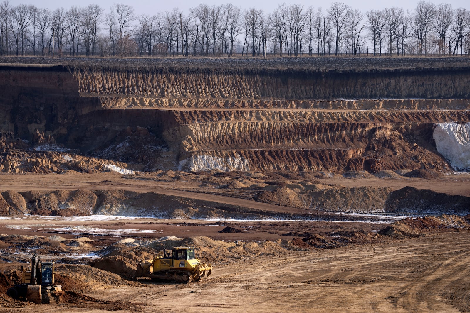 A view of an ilmenite open pit mine in a canyon in the central region of Kirovohrad, Ukraine, Wednesday, Feb. 12, 2025. (AP Photo/Efrem Lukatsky)