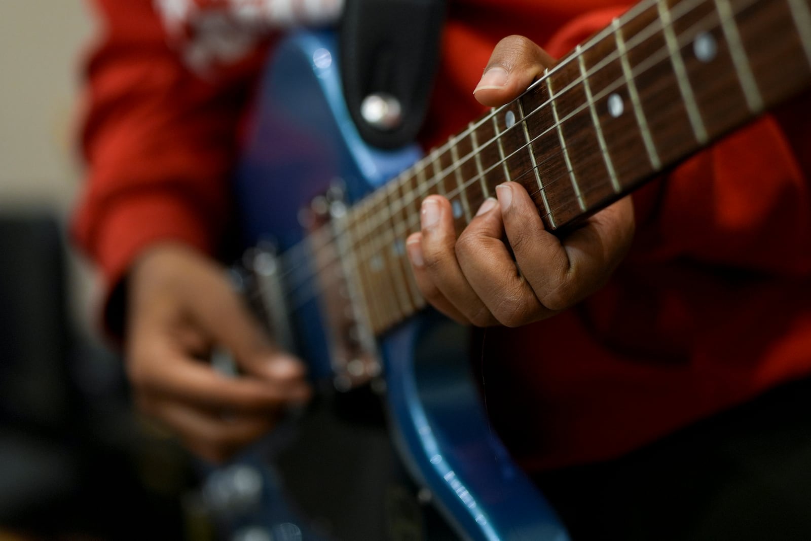 A musician rehearses on a guitar at Stax Music Academy, Thursday, Jan. 30, 2025, in Memphis, Tenn. (AP Photo/George Walker IV)