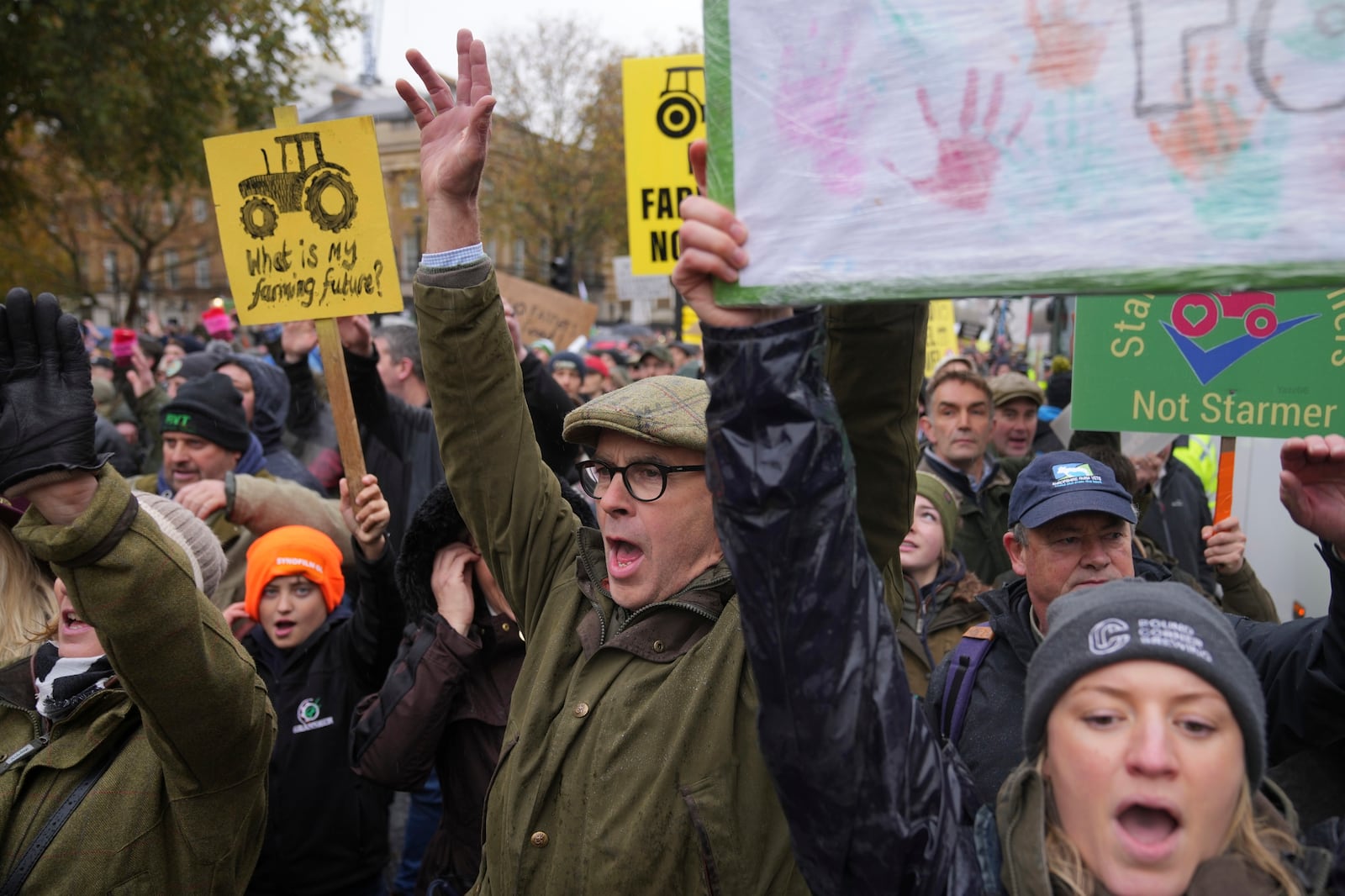 Farmers protest to urge the government to change course over its inheritance tax plans, in London, Tuesday, Nov. 19, 2024. (AP Photo/Kin Cheung)