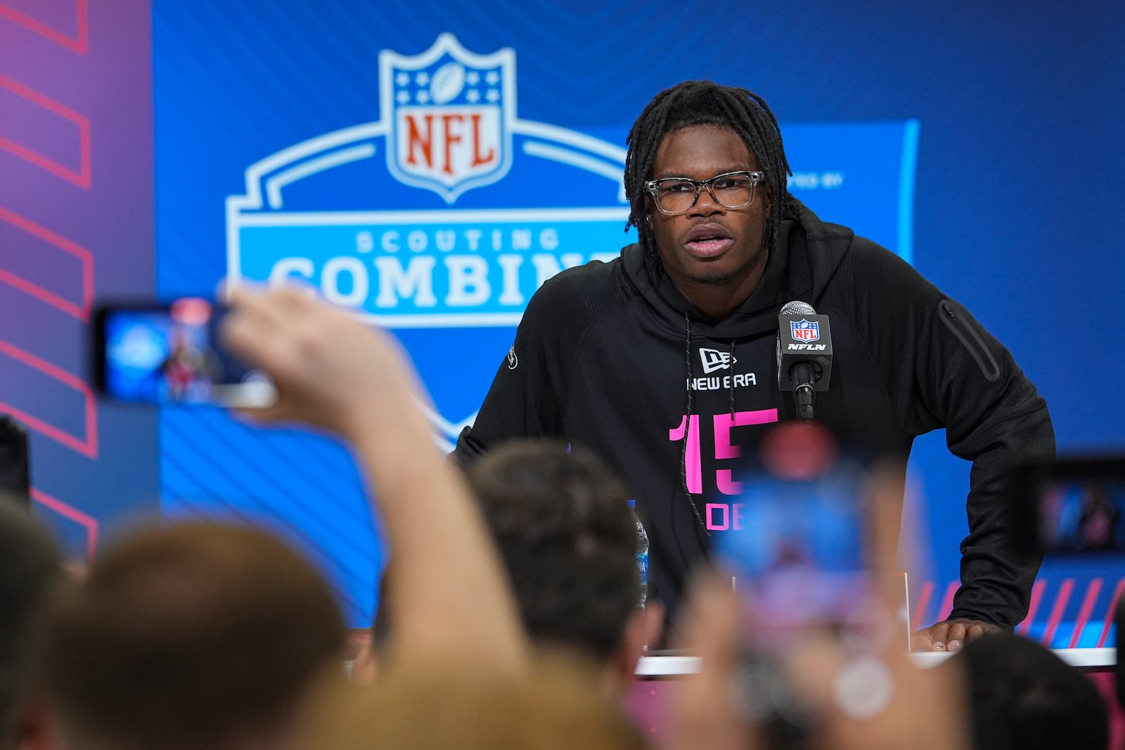 Colorado defensive back Travis Hunter speaks during a press conference at the NFL football scouting combine in Indianapolis, Thursday, Feb. 27, 2025. (AP Photo/Michael Conroy)