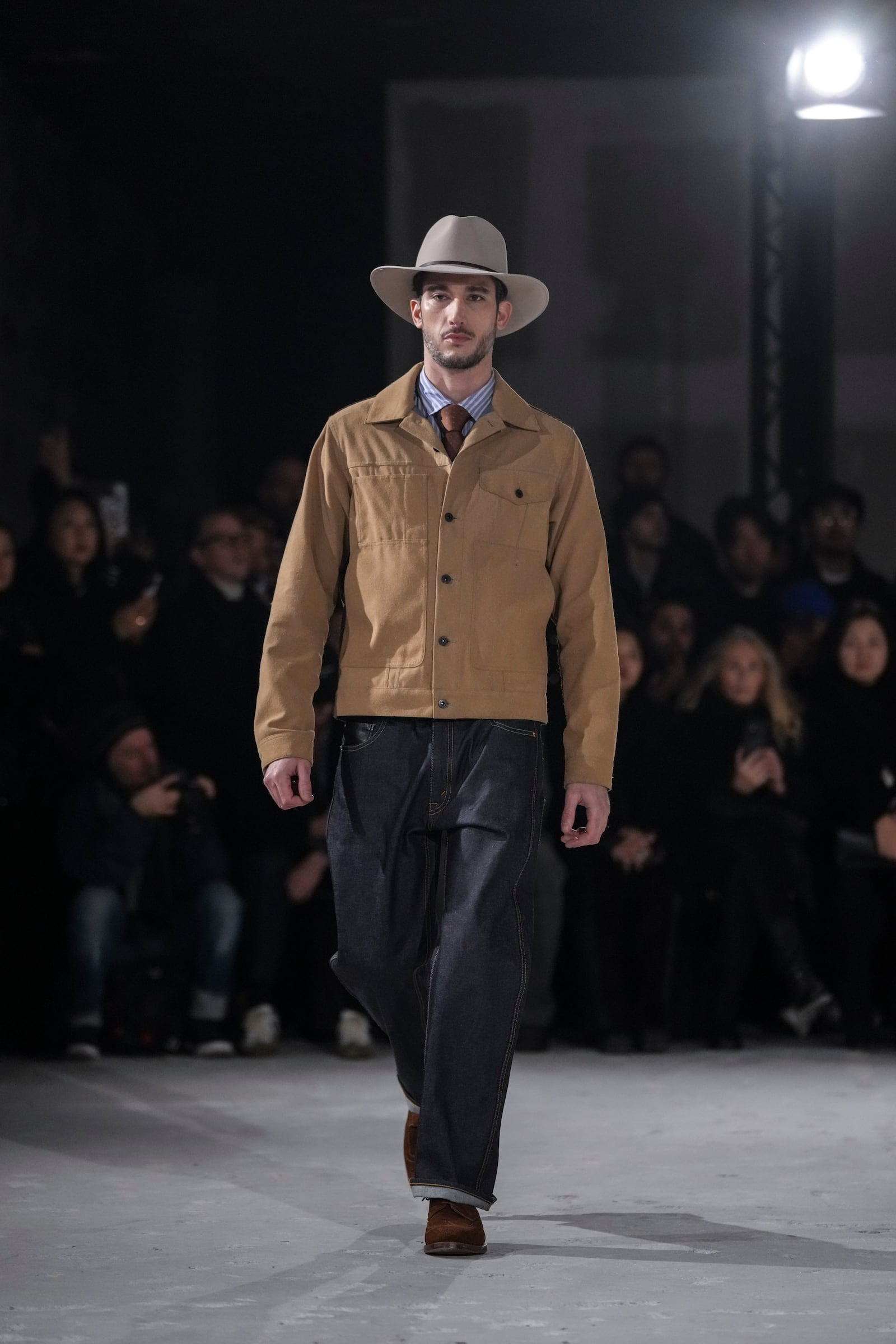 A model wears a creation as part of the men's Junya Watanabe Fall-Winter 2025-2026 collection, that was presented in Paris, Friday, Jan. 24, 2025. (AP Photo/Thibault Camus).