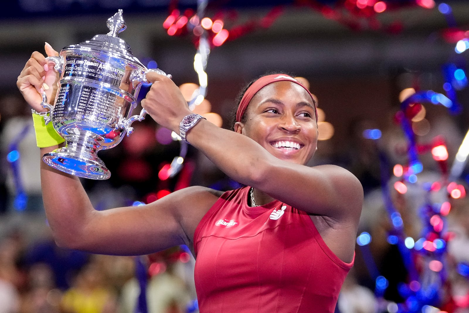 FILE - Coco Gauff, of the United States, holds up the championship trophy after defeating Aryna Sabalenka, of Belarus, in the women's singles final of the U.S. Open tennis championships, Sept. 9, 2023, in New York. (AP Photo/Frank Franklin II, file)