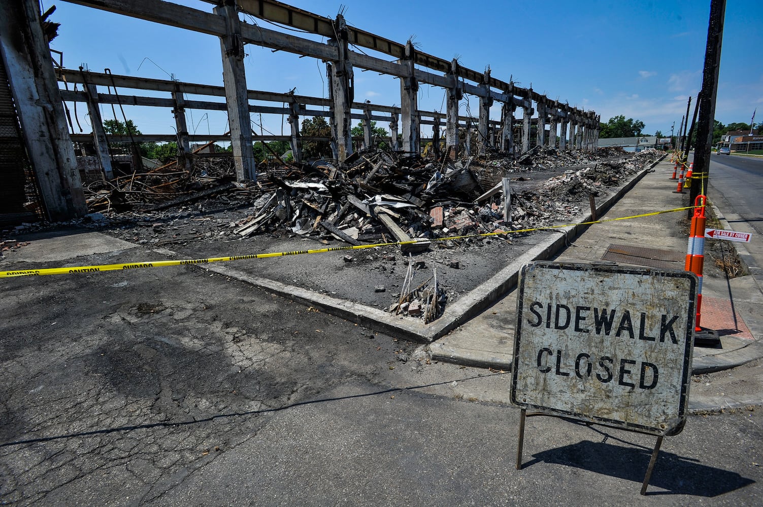 Crews demolish warehouse after massive fire in Hamilton