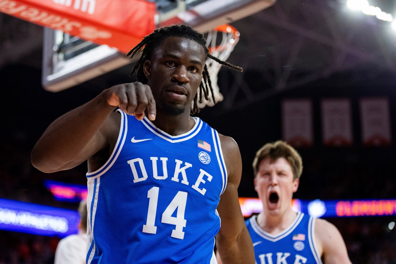 Duke guard Sion James (14) celebrates after scoring against Clemson during the first half of an NCAA college basketball game Saturday, Feb. 8, 2025, in Clemson, S.C. (AP Photo/Scott Kinser)