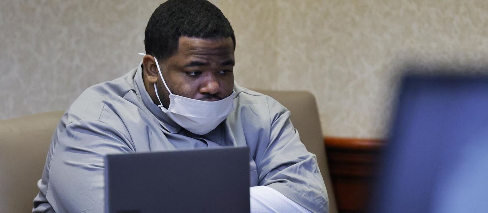 Mychel King sits in a Butler County Common Pleas courtroom Tuesday during his murder trial. King is accused of shooting and killing Jaylon Knight in 2016. NICK GRAHAM/STAFF