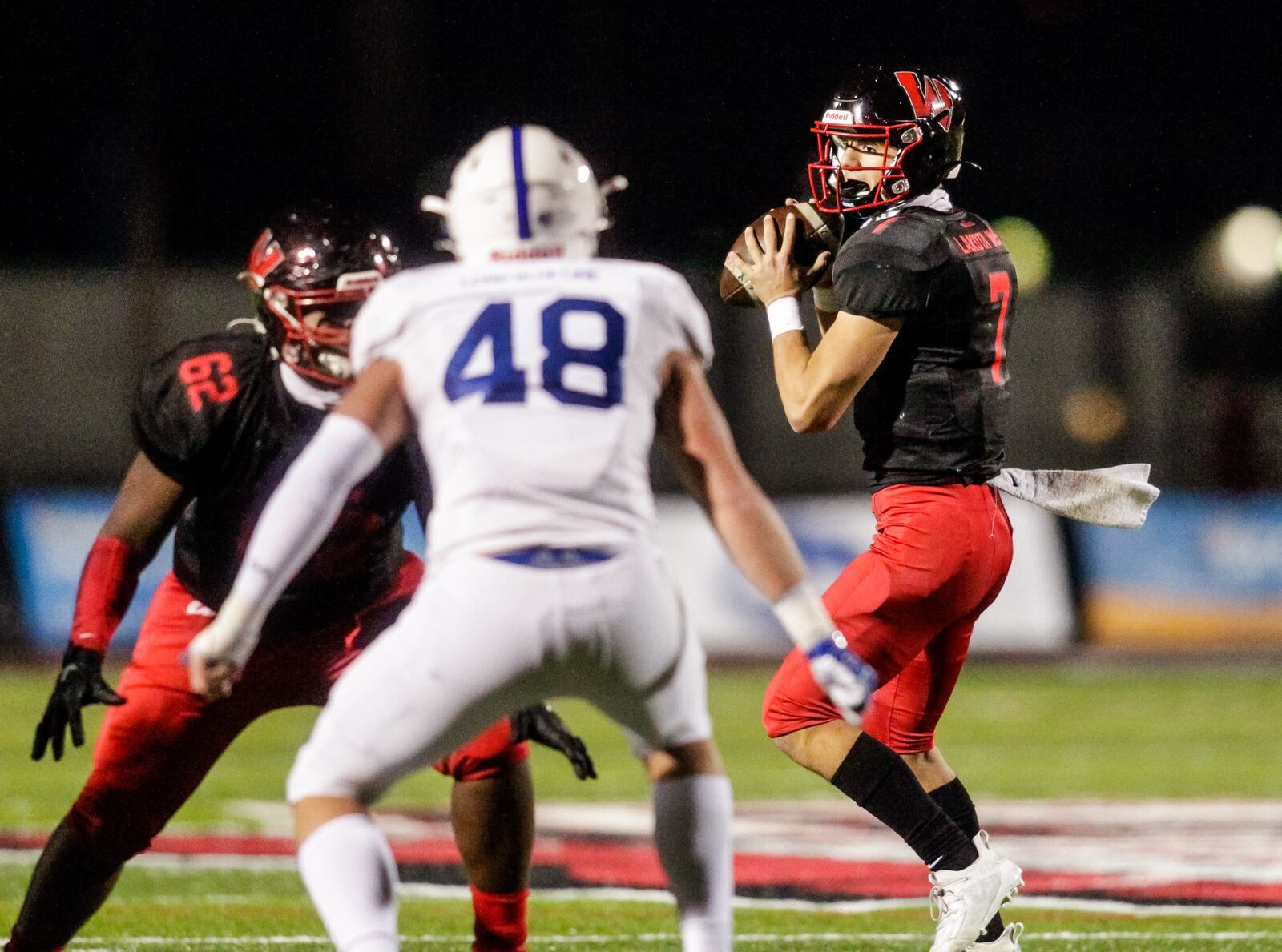 Lakota West quarterback Mitch Bolden makes a pass during their playoff football game against St. Xavier Friday, October 30, 2020 at Lakota West High School in West Chester Township. The St. Xavier Bombers won 10-7 to advance to the state semifinal. NICK GRAHAM / STAFF