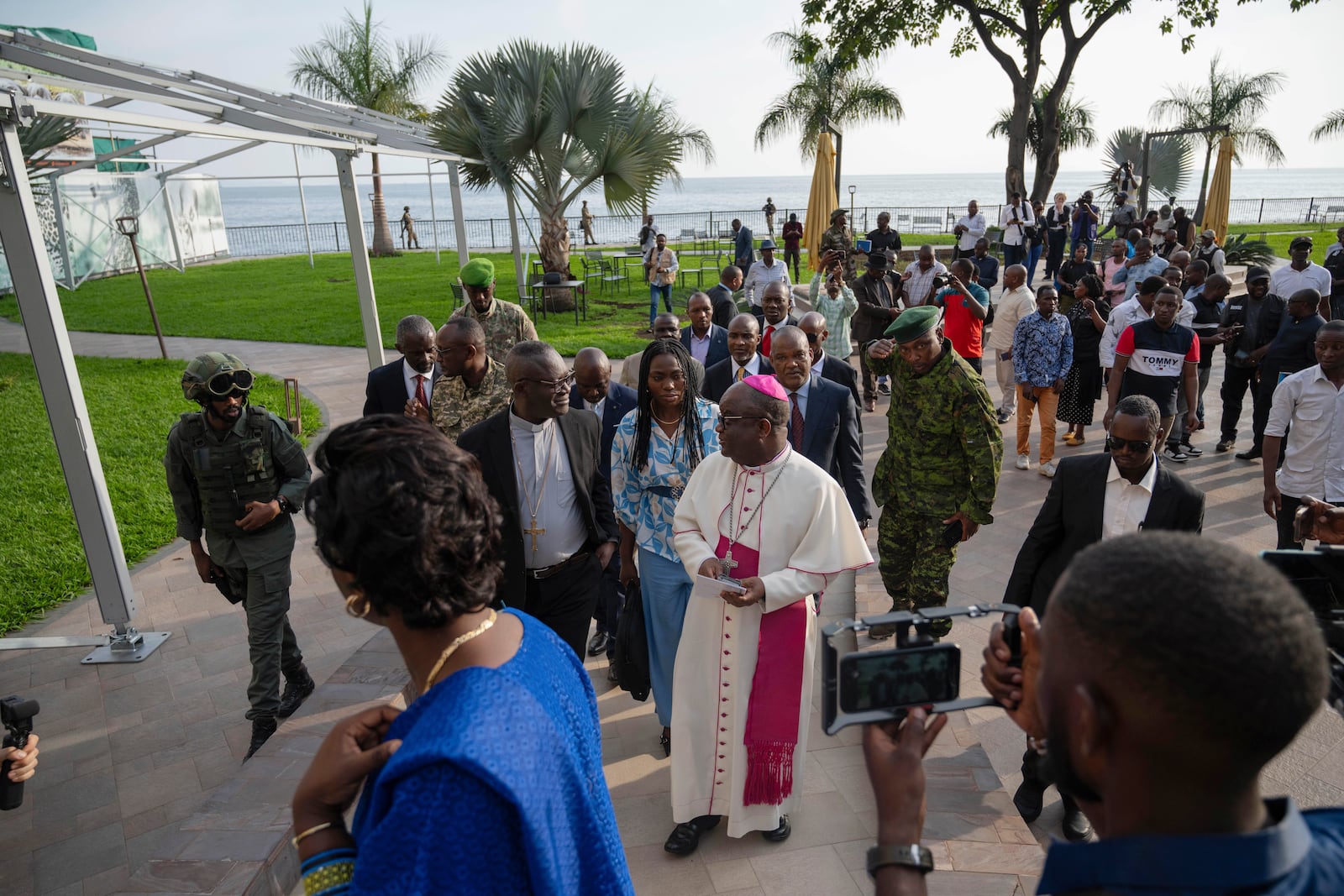 Members of the National Episcopal Conference of Congo and the Church of Christ arrive for a meeting with the leader of the political military coalition in Goma, Democratic Republic of the Congo, Wednesay, Feb. 12, 2025. (AP Photo/Moses Sawasawa)