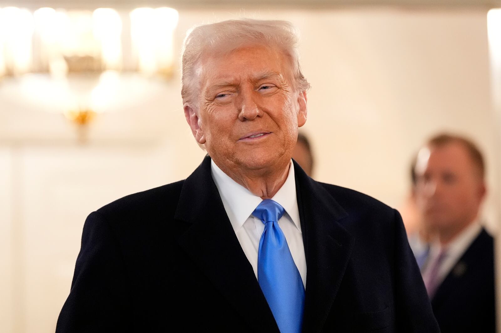 President Donald Trump arrives to greet Marc Fogel at the White House, Tuesday, Feb. 11, 2025, in Washington. (Photo/Alex Brandon)