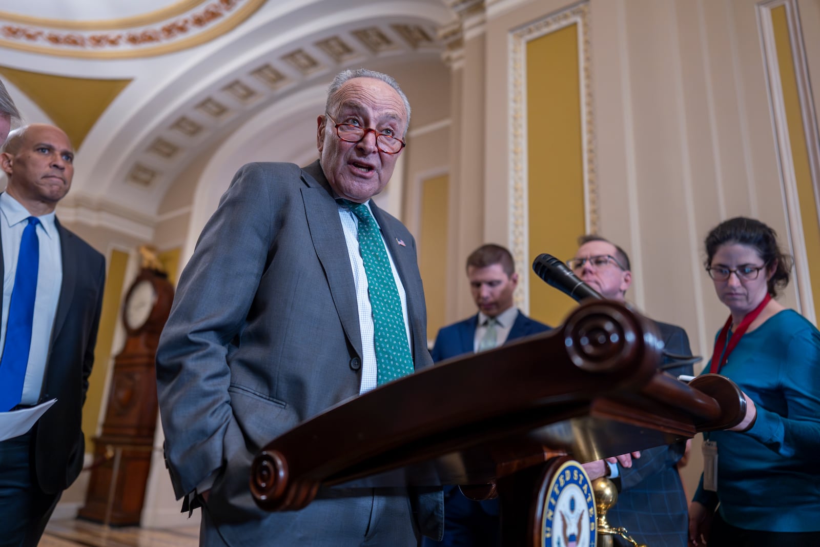 Senate Minority Leader Chuck Schumer, D-N.Y., speaks with reporters as Republicans work to pass an interim spending bill that would avoid a partial government shutdown and keep federal agencies funded through September, at the Capitol in Washington, Tuesday, March 11, 2025. (AP Photo/J. Scott Applewhite)