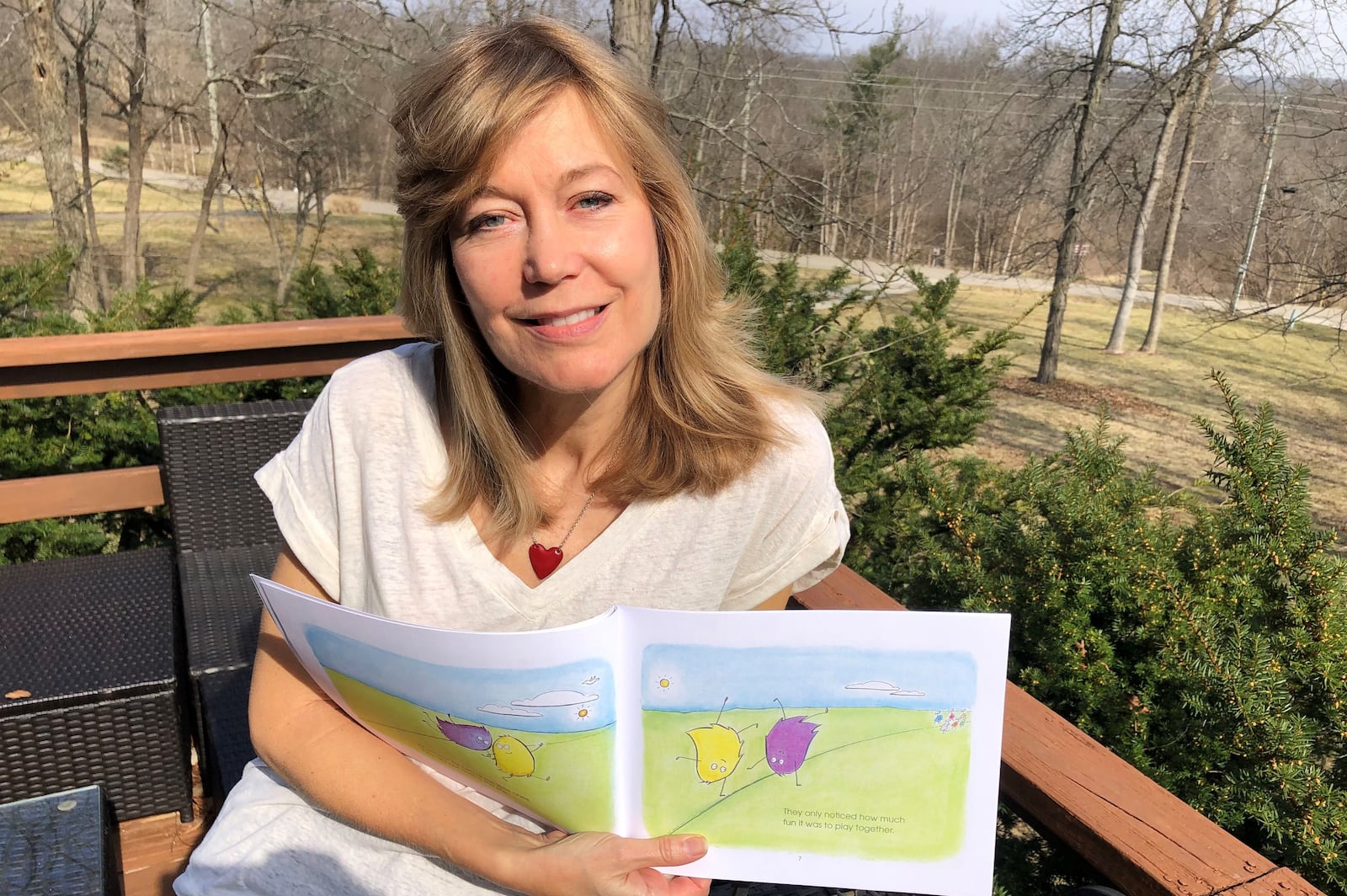 Marianne Reed recently released her first children's book, The Boogies and the Woogies. She wrote and illustrated the 27-page book. RICK McCRABB/STAFF