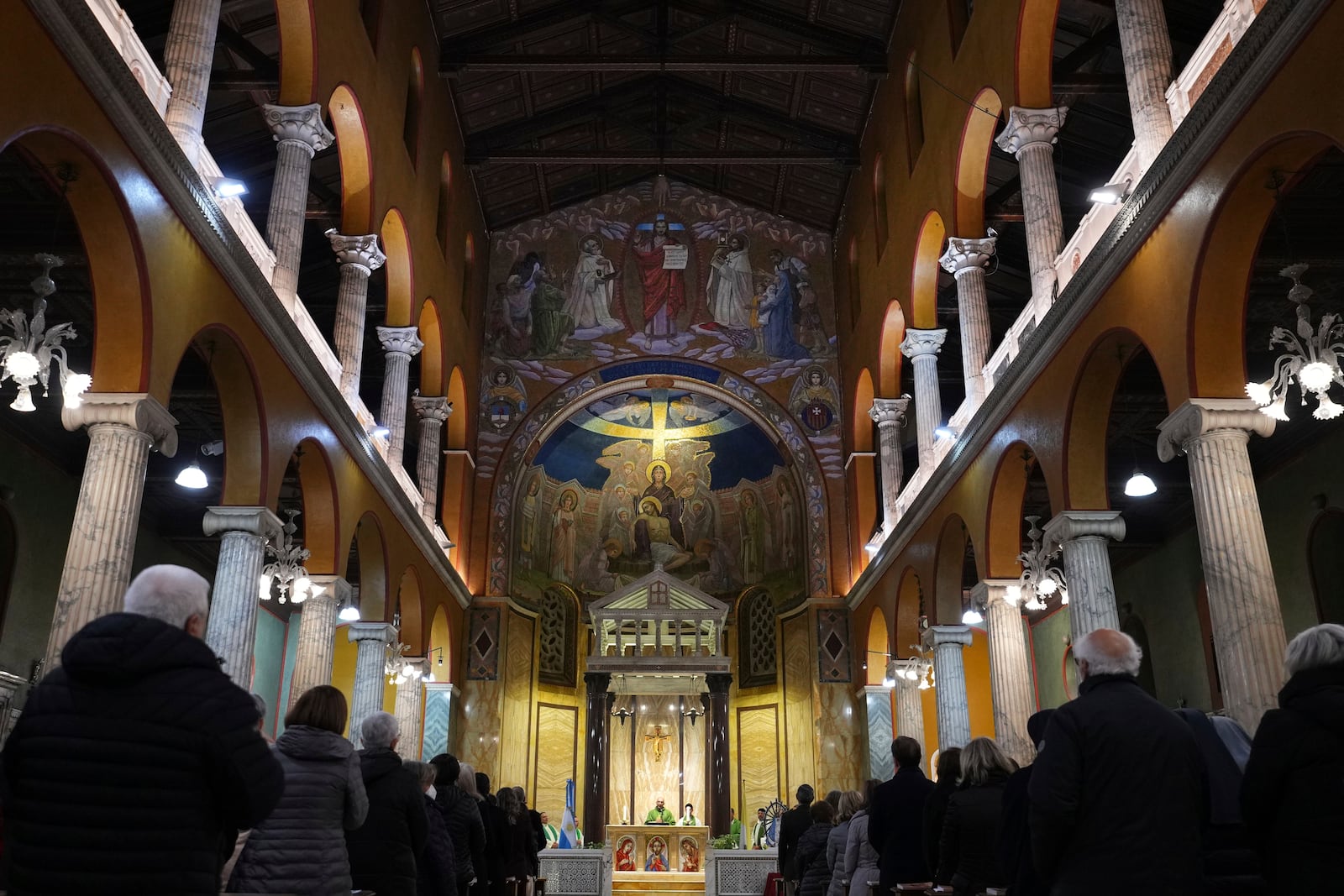 Pope's Vicar for Rome, Cardinal Baldassare Reina celebrates mass for the health of Pope Francis at the Church of the Argentinas, Santa Maria Addolorata in Rome, Italy Tuesday, Feb. 25, 2025. (AP Photo/Kirsty Wigglesworth)