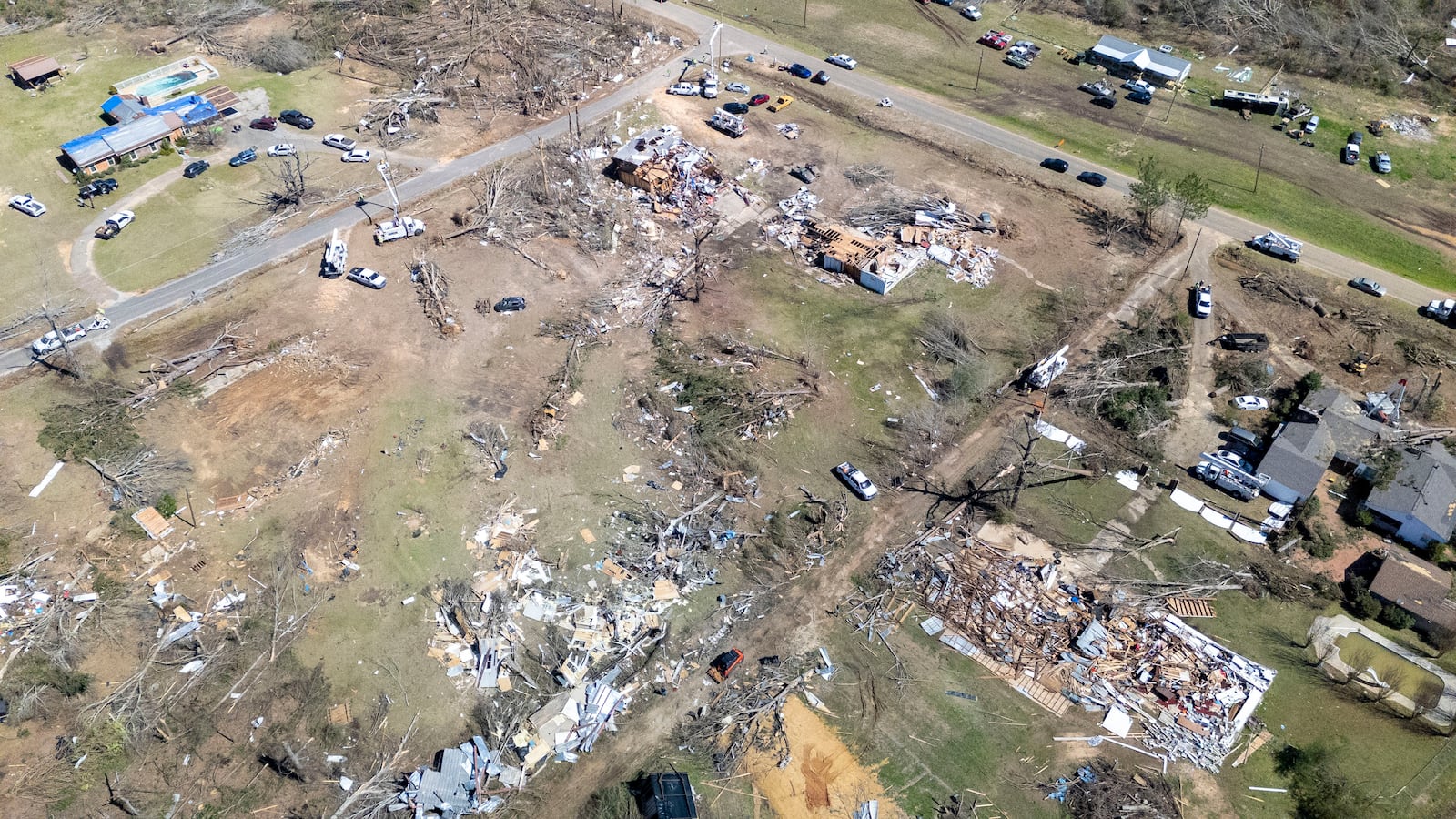 This image taken with a drone shows storm damage at the Lovelady Lane and Dallas County 63 interchange, Monday, March 17, 2025, in Plantersville, Ala, following deadly tornados that hit the area Saturday. (AP Photo/Vasha Hunt)