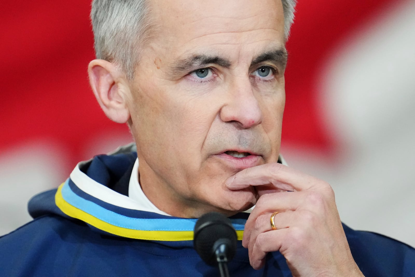 Canada Prime Minister Mark Carney answers questions from the media after making an announcement at a Canadian Armed Forces forward-operating location in Iqaluit, Nunavut, on Tuesday, March 18, 2025. (Sean Kilpatrick/The Canadian Press via AP)