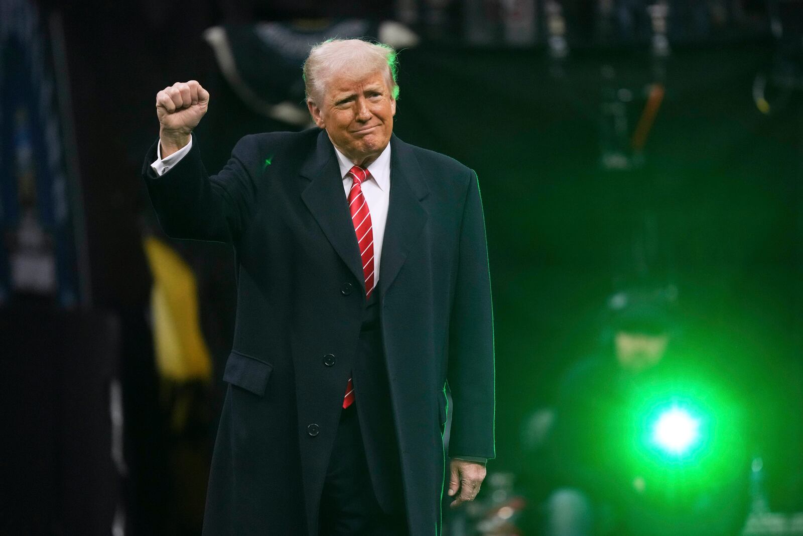 President Donald Trump attends the finals at the NCAA wrestling championship, Saturday, March 22, 2025, in Philadelphia. (AP Photo/Matt Rourke)