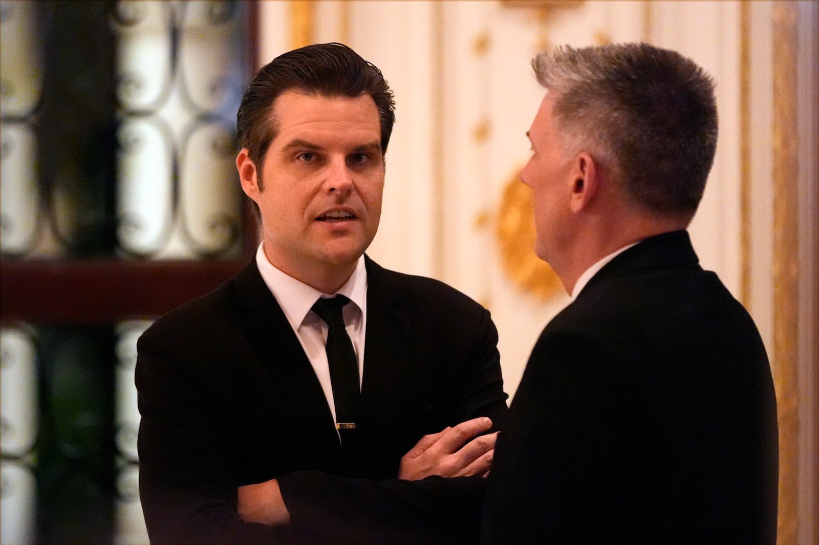 Matt Gaetz talks before President-elect Donald Trump speaks during an America First Policy Institute gala at his Mar-a-Lago estate, Thursday, Nov. 14, 2024, in Palm Beach, Fla. (AP Photo/Alex Brandon)