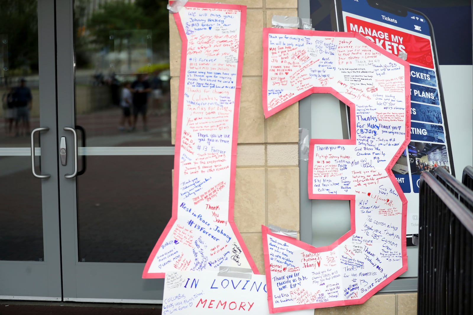 A memorial is set up by fans for Blue Jackets hockey player Johnny Gaudreau in Columbus, Ohio, Aug. 30, 2024. Gaudreau, along with his brother Matthew, was fatally struck by a motorist while riding his bicycle on Thursday. (AP Photo/Joe Maiorana)