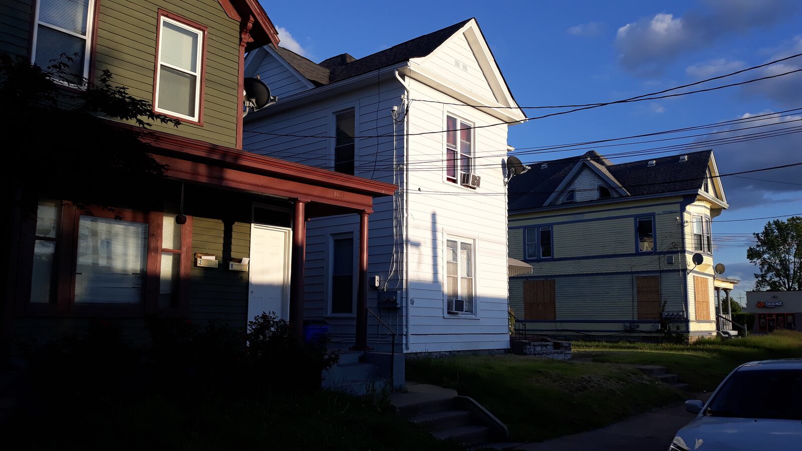 Hamilton is preparing to buy 12 and 16 N. 10th Street, the two closest in this photo, to make way for a residential development at 10th and High streets. MIKE RUTLEDGE/STAFF