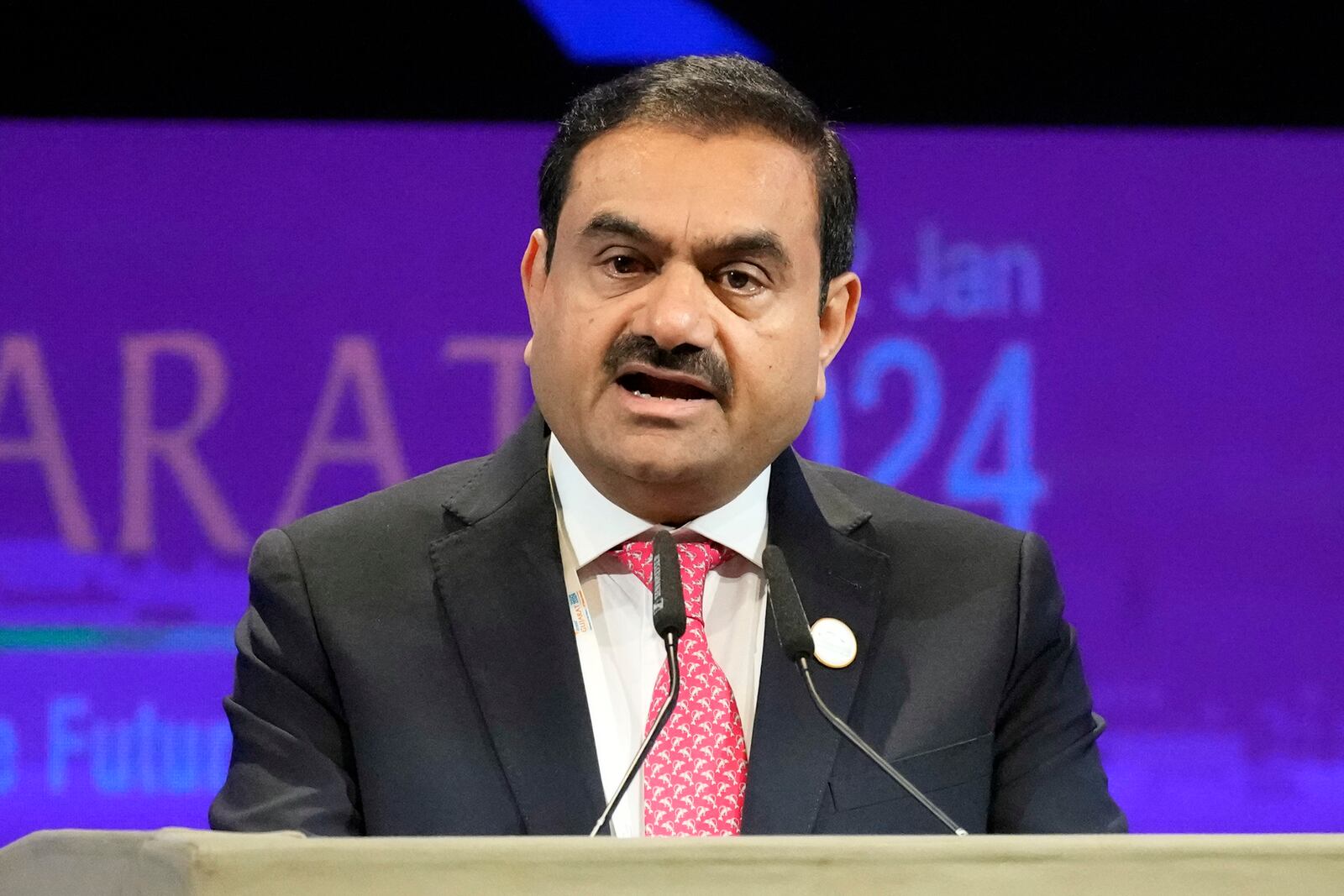 FILE - India's Adani Group Chairman Gautam Adani addresses the Vibrant Gujarat Global Summit in Gandhinagar, India, Jan.10, 2024. (AP Photo/Ajit Solanki, File)