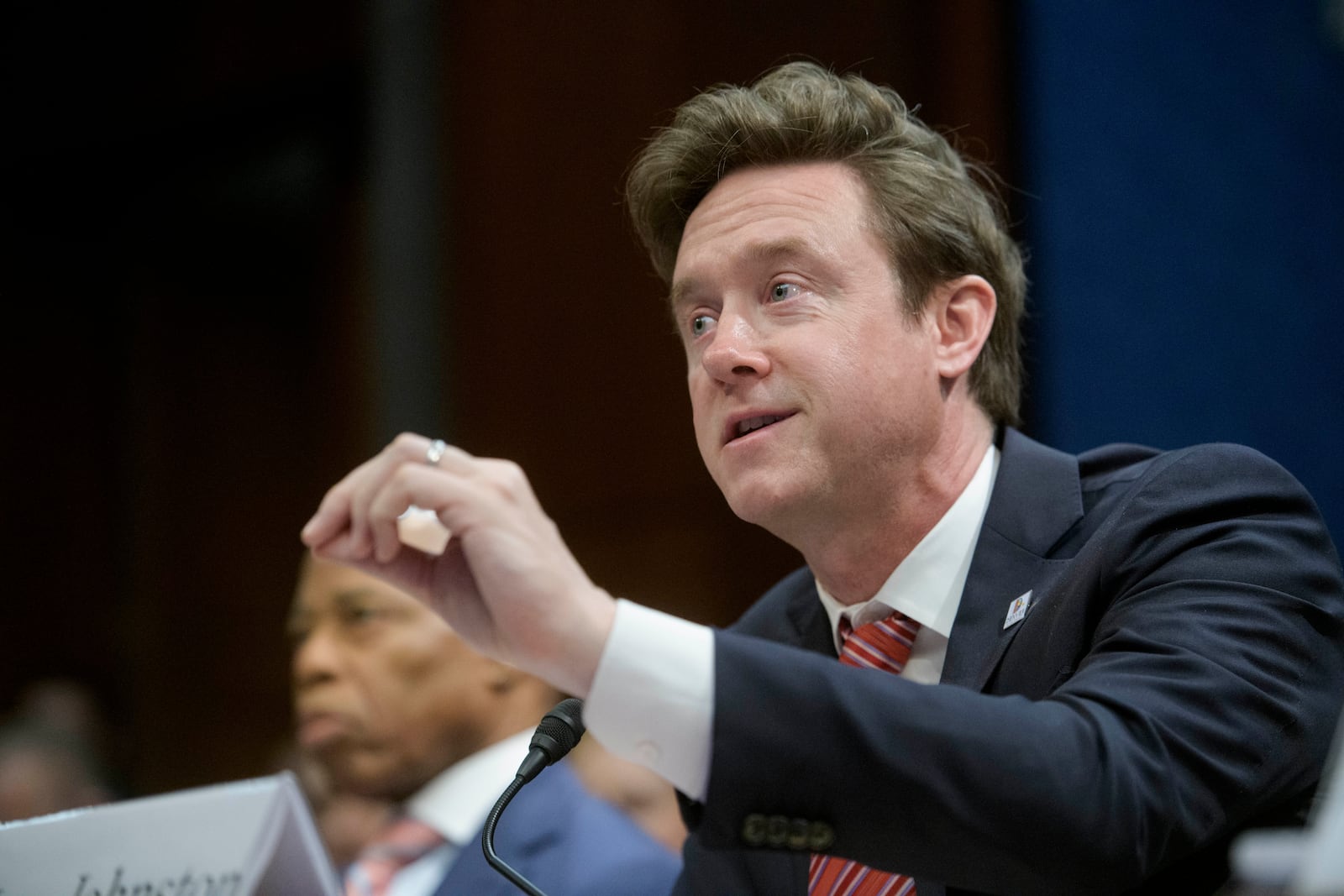 Denver Mayor Mike Johnston responds to questions during a House Committee on Oversight and Government Reform hearing with Sanctuary City Mayors on Capitol Hill, Wednesday, March 5, 2025, in Washington. (AP Photo/Rod Lamkey, Jr.)