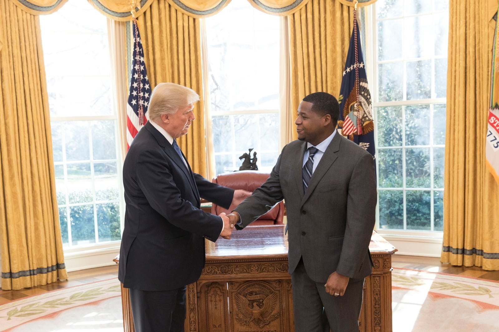 President Donald J. Trump welcomes State of the Union honored guests, Corey Adams, a skilled welder for the Staub Manufacturing Solutions in Dayton, to the Oval Office at the White House, Tuesday, Jan. 30, 2018, in Washington, D.C. (Official White House Photo by Shealah Craighead)