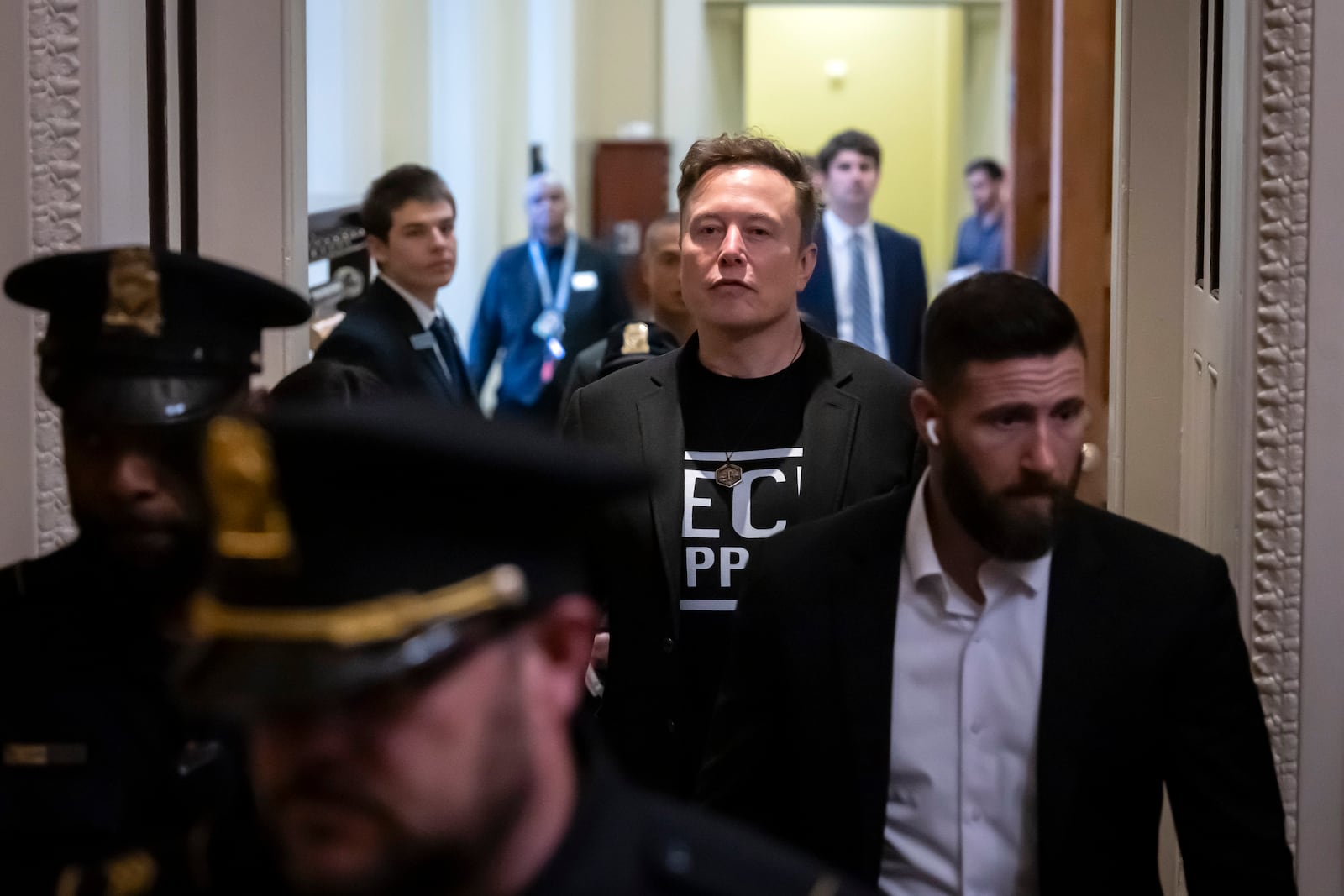 Elon Musk leaves after meeting with Senate Republicans, at the Capitol in Washington, Wednesday, March 5, 2025. (AP Photo/Ben Curtis)