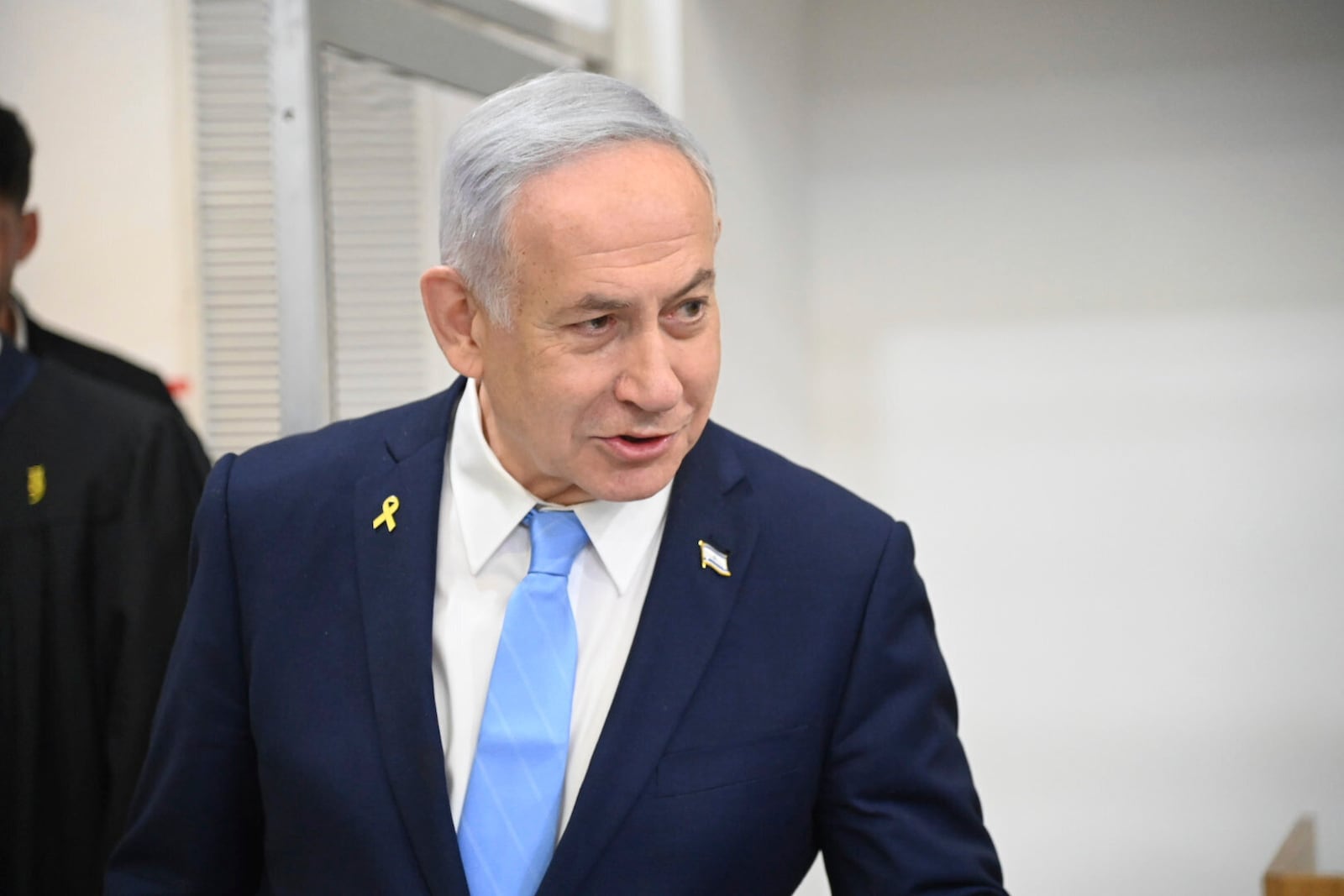 Israel's Prime Minister Benjamin Netanyahu attends his trial on corruption charges at the district court in Tel Aviv, Israel, Wednesday, March 12, 2025. (Yair Sagi/Pool Photo via AP)