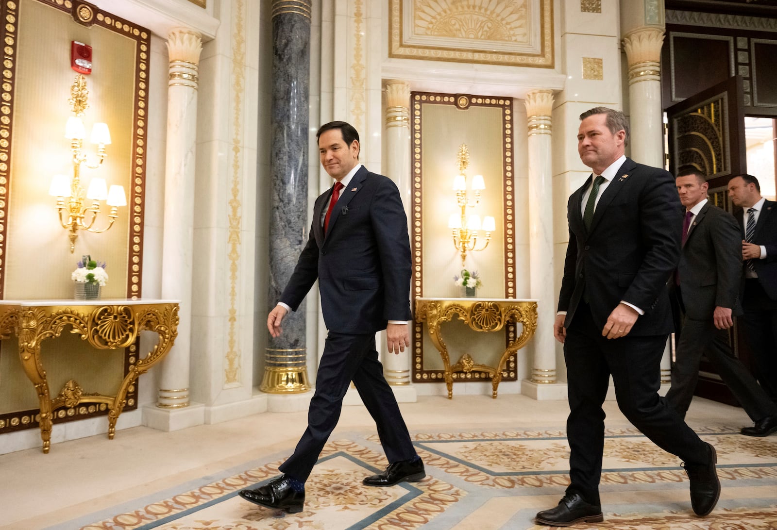 U.S. Secretary of State Marco Rubio, left, and U.S. National Security Advisor Mike Waltz arrive to speak with the media following meetings with a Ukrainian delegation in Jeddah, Saudi Arabia, March 11, 2025. (Saul Loeb/Pool Photo via AP)