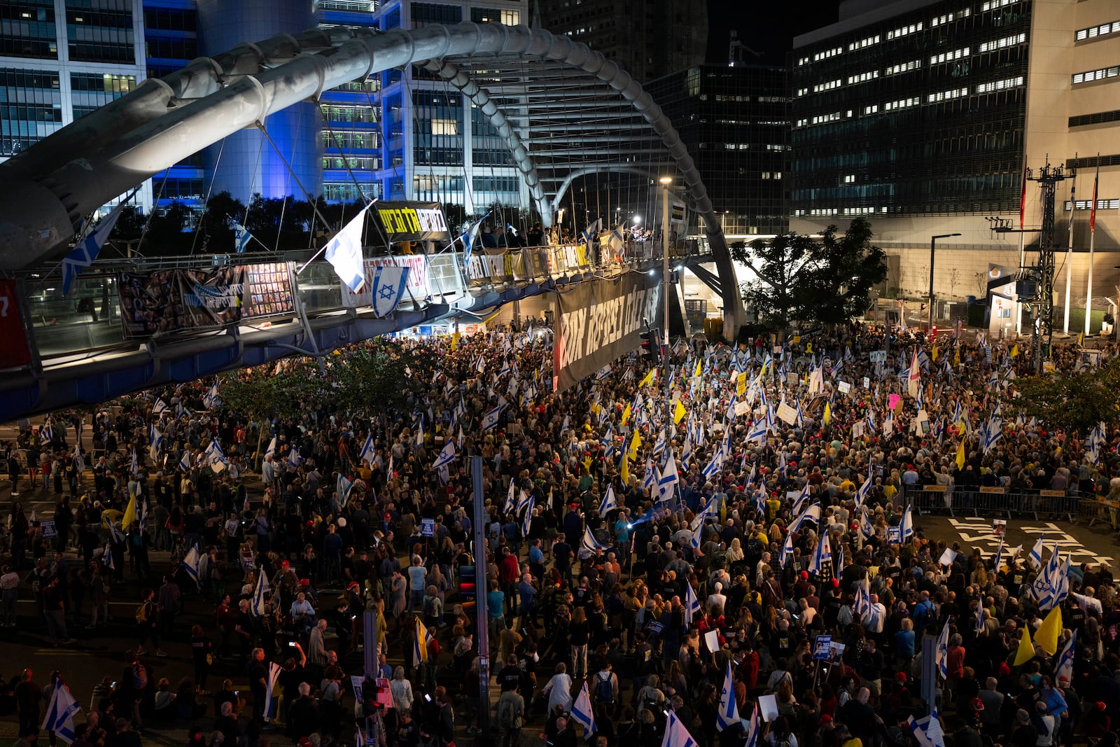 People take part in a protest demanding the immediate release of hostages held by Hamas in the Gaza Strip, in Tel Aviv, Israel, Saturday, March 15, 2025. (AP Photo//Oded Balilty)