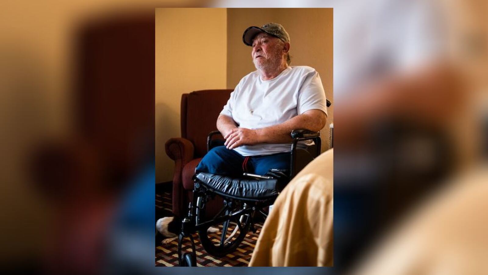 Army veteran Charles Knuckles tells his story about how he ended up staying at a hotel in Middletown. Knuckles lost his legs due to complications from injuries he sustained in the Army. NICK GRAHAM / STAFF