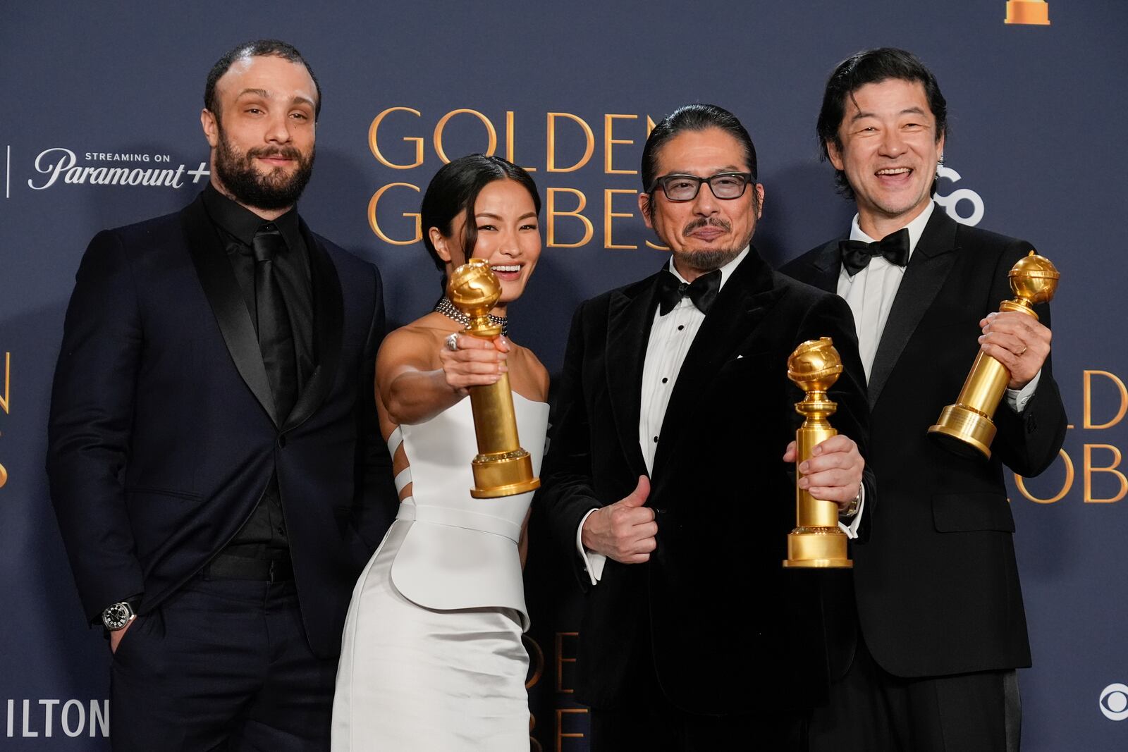 Cosmo Jarvis, from left, Anna Sawai, Hiroyuki Sanada, and Tadanobu Asano pose in the press room with the award for best television series - drama for "Shogun" during the 82nd Golden Globes on Sunday, Jan. 5, 2025, at the Beverly Hilton in Beverly Hills, Calif. (AP Photo/Chris Pizzello)