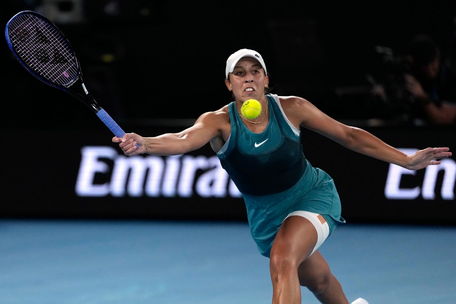 Madison Keys of the U.S. plays a forehand return to Aryna Sabalenka of Belarus during the women's singles final at the Australian Open tennis championship in Melbourne, Australia, Saturday, Jan. 25, 2025. (AP Photo/Ng Han Guan)