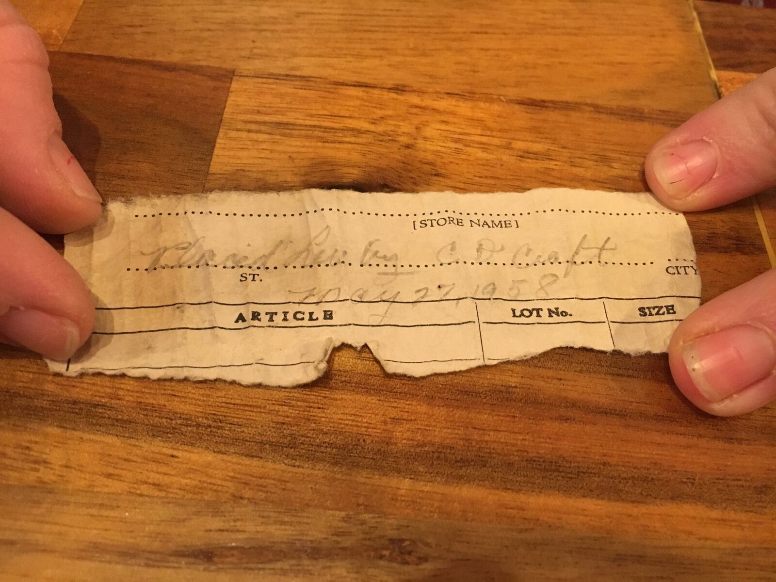 Behind a loose brick in the basement of West Central Wine on Central Avenue in downtown Middletown, the shop’s owners found a note that was left there nearly 60 years ago. They tracked down a family member of the man who wrote the note. 