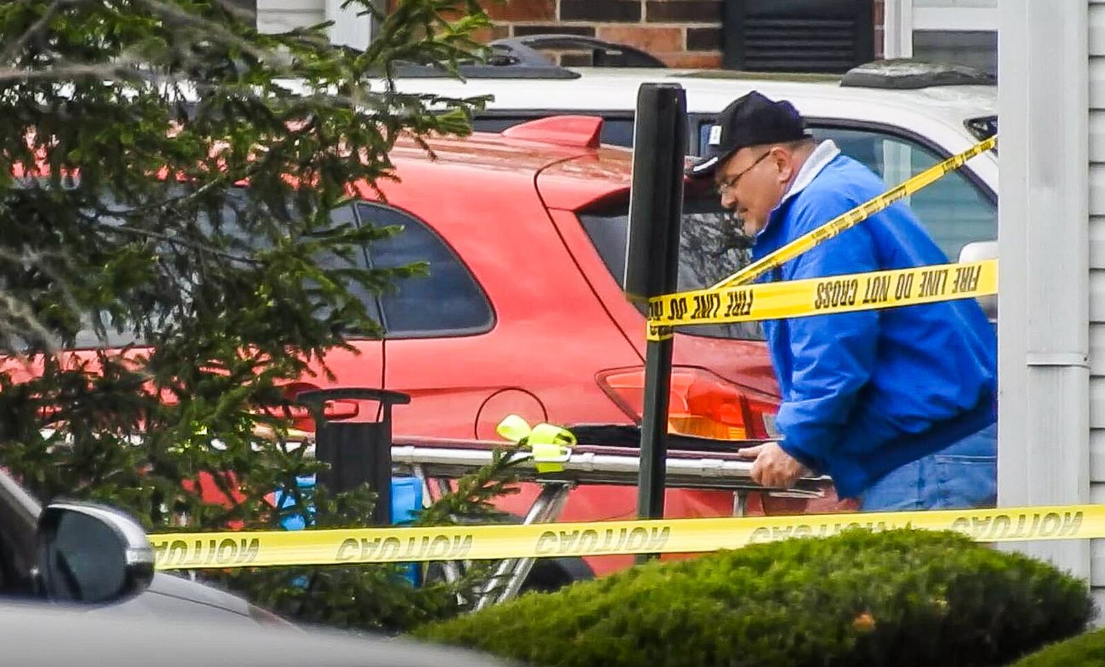 The Butler County Coroner’s office investigated at the scene where four people were found dead with apparent gunshot wounds inside an apartment at Lakefront at West Chester apartment complex on Wyndtree Drive in West Chester Township Monday, April 29, 2019. NICK GRAHAM/STAFF