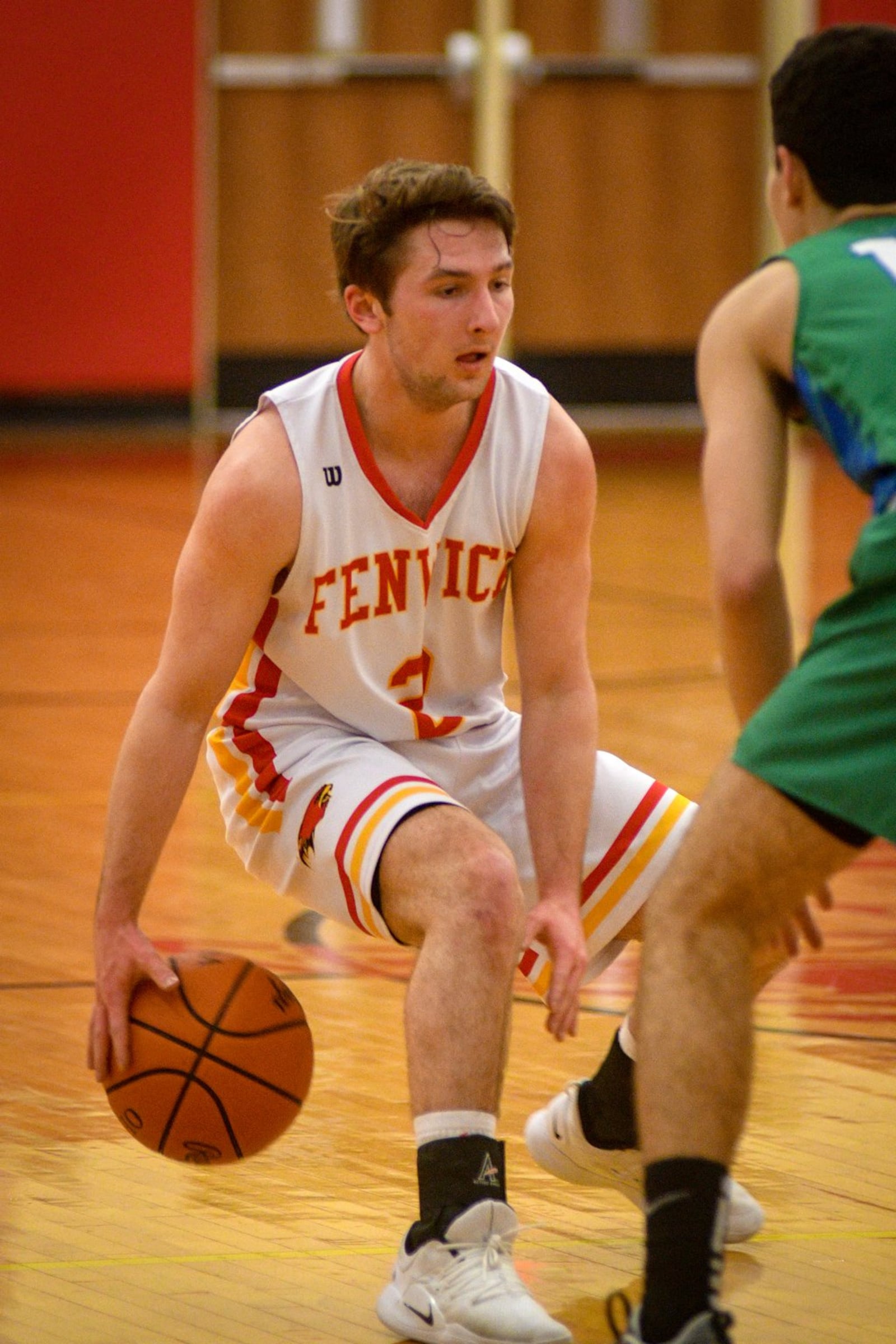 Fenwick’s Jared Morris dribbles against Chaminade Julienne’s Jack Nauseef during Friday night’s game in Middletown. CJ won 68-63 in double overtime. ROB MCCULLEY/RAM PHOTOGRAPHY